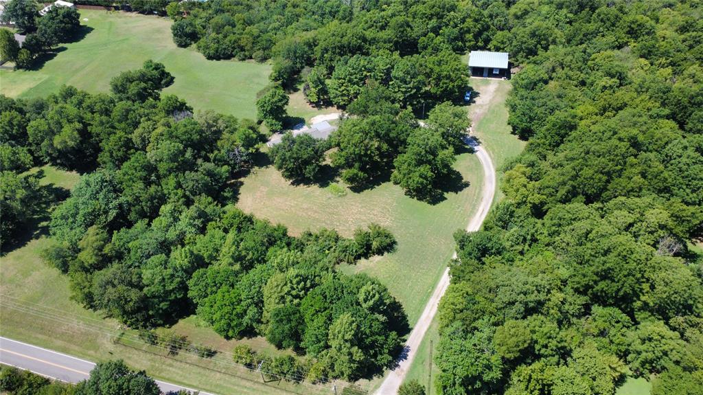 One of a kind 5 acre Estate to make your own! Secluded and unrestricted acreage located within minutes of the interstate in the well sought out Goldsby area. A Ranch style home overlooks the secluded acreage with mature trees and areas of wide open spaces. Whether you plan to build or remodel this property has so much potential!

Goldsby Water services, Septic system, New roof installed in 2024