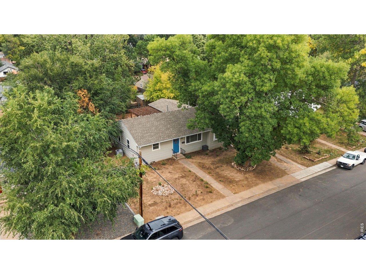 Tucked in one of Fort Collins' most walkable pockets, 1108 Beech St is a 4-bedroom, 2-bathroom ranch that pairs mostly updated finishes with an unbeatable location. Just steps to City Park, Martinez Park, Little on Mountain, Beavers Market, downtown, and the Poudre River, this is the kind of address where morning runs, weekend farmers markets, and evening walks to dinner all become part of everyday life.Inside, this gem has seen significant updates throughout. Granite countertops and ceiling-height cabinetry anchor a kitchen built for both function and style, complemented by newer stainless appliances - no near-term replacements to budget for. Beautiful hardwood flooring runs throughout every room, paired with new lighting and updated fixtures that give the whole home a polished, cohesive feel. Great natural light fills the living spaces, making rooms feel even larger and brighter than the square footage alone suggests.The primary bedroom offers a lovely private touch - sliding doors that open directly to the back patio, blurring the line between indoor and outdoor living and creating an easy retreat at the end of the day. A newer roof rounds out the major updates, giving buyers confidence that the big-ticket items have already been handled.This ranch-style layout offers the single-level living so many buyers are searching for, now paired with mostly updated systems and finishes rather than just cosmetic touch-ups. Combined with a location that puts parks, shopping, the river, and downtown Fort Collins all within easy walking reach, 1108 Beech St offers a rare blend of lifestyle and long-term value that's difficult to replicate anywhere else in the city.
