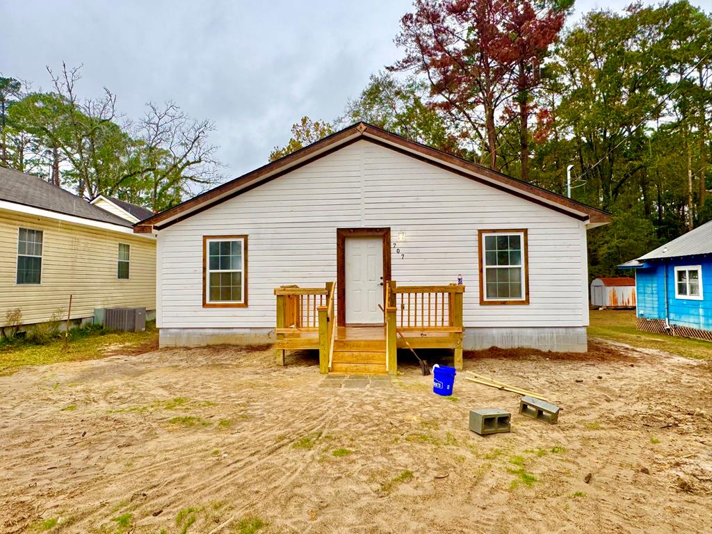 This a one in a lifetime opportunity to own a brand new construction home in the heart of Thomasville GA. When you step inside this charming residence you will see beautiful all pine wood walls made from 1X6 Pine boards with honey colored wood trim. Every interior door and casing are made out of 100 percent custom crafted wood giving this home a truly one of a kind feeling. The builder spared no expense to ensure this home will stand the test of time! The home is built on a concrete slab with solid poured concrete stem wall foundation and double the anchor bolts of a normal house. This allows the home to have incredible structural integrity at the foundation that will prevent any kind of shifting or sliding due to weight, seismic activity or high speed winds. The home was built using 2X6 framing allowing for more spray foam insulation that increases energy efficient and soundproofing of the home. The builder when the extra mile to make this home the most energy efficient home possible! The home has double pane high efficiency windows and an infinitely variable speed condenser unit and blower motor. This will allow the home to be highly energy efficient for reduced utility bills and comfort. This home will not need any updates for many decades to come with a 30 year shingle roof and 12 gauge wiring. This property presents a rare opportunity to own a newly built home outside of a subdivision and without the constraints of an HOA in Thomasville GA. This new construction home is 1,280 square feet with 4 bedrooms and 2 full bathrooms. Ideal for large families, this four-bedroom layout also offers ample space for storage or home office. A brand new home at a great price in Thomasville GA, schedule your showing today.