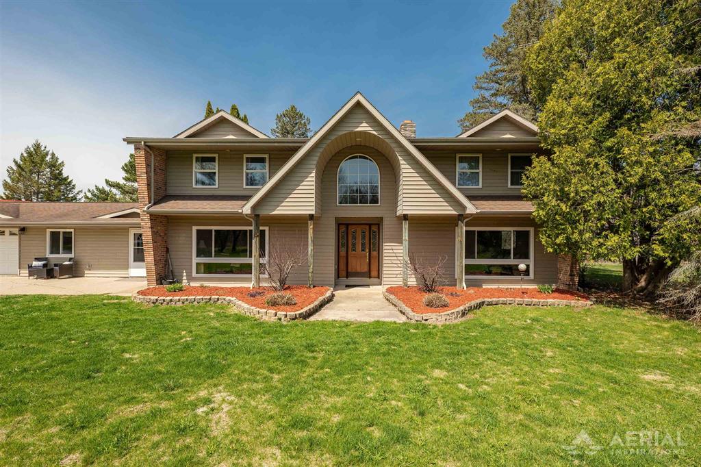 Spacious 5-Bedroom Home on 10.8 Acres with Pond, Fruit Trees & Barn - Minutes from Town! Experience the perfect balance of privacy and convenience with this beautiful 5-bedroom, 4-bathroom home set on 10.8 acres of scenic countryside-just minutes from town. Whether you crave peaceful rural living or quick access to everyday essentials, this property offers the best of both worlds. Five comfortable bedrooms, including a spacious primary suite. Bright, open living spaces with large windows and scenic views. Dedicated home office for remote work. Lots of closet space and a full basement for storage. Pond views are perfect for relaxing afternoons or nature watching. Mature apple and cherry trees-fresh fruit right from your yard. Barn and utility shed ideal for equipment, or hobbies. Sprawling lawns and wooded spaces offer privacy, room to play, and natural beauty. All this is just a short drive to shops, schools, dining, and more-enjoy quiet country life without giving up town conveniences. A rare opportunity-schedule your showing today and experience it for yourself!