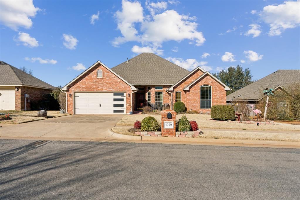 This wonderful family home sits in a gated neighborhood with a community pool and clubhouse ready for your family gatherings. Step inside to an inviting layout with two generous living spaces, a functional kitchen with pantry, new dishwasher and microwave and natural oak cabinetry.  This home is perfect for a growing family with 4 bedrooms or anyone wanting to downsize to 3 bedrooms and an office. EXCELLENT MECHANICAL IMPROVEMENTS THAT MAKE IT TRULY MOVE-IN READY. The home’s recently installed HVAC system (2019) provides peace of mind, while the brand-new patio doors (2025) bring in the natural light and also enhances indoor-outdoor flow. Fresh paint in the main living areas and bedrooms. New outdoor lights for the front of the home and a new shed in the backyard for all your landscaping tools & equipment. Extensive landscaping with a beautiful retaining wall and flower beds that are ready for this spring’s blooming season.