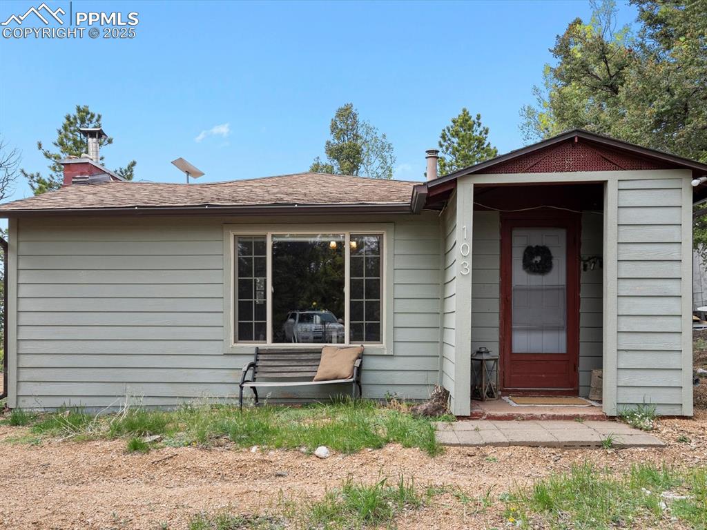The mountains are calling and you must go! This peaceful original hunting cabin in the woods resides on a quiet street in Tranquil Acres with easy access to downtown Woodland Park, lakes, the Colorado Wolf and Wildlife Center, and amazing views of Pikes Peak. This home features a knotty pine interior with vaulted ceilings, a Vermont Castings wood burning fireplace, and an antique wood cook stove in great working order. A brand new engineered septic system and a 1,500 gallon cistern were installed for running water and comfort. There is a working outhouse behind the home as well that can be turned into a chicken coop or another shed. This cozy cabin is the perfect retreat in every season! Make it your forever home, 2nd home, or even your rental home to generate some income as this house is outside of any short term rental restrictions. Selling fully furnished!