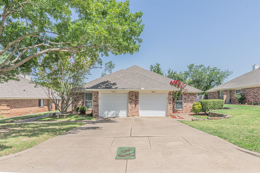 Say hello to this wonderfully maintained duplex in the highly sought after Oak Hills neighborhood. The property has already been fully updated and is MOVE IN READY. Tile and Luxury Vinyl Plank floors throughout! Perfect condition! The kitchen has plenty of cabinet space and well maintained countertops. The living room has very tall ceilings and a wood burning fireplace. Both of the bathrooms have been thoughtfully renovated with lush tile in the shower and a striking granite counter top. This property is the prime location while being zoned in the award winning Birdville ISD and also within close proximity to Highway 121 and being right off Precinct Line Rd. Each unit is a 3 bed 2 bath with 1,270 square feet and 1 car garage. 9267 is vacant currently and is ready to be rented out! 9265 is currently leased out for $2,285 per month and is on a month to month basis. Sellers have another duplex right next to this one that's also for sale, 9269-9271 Meandering. MLS #21339380.  Don't miss out on this perfect opportunity for any of your investment goals. Schedule your showing today! Roof currently in process of being replaced!