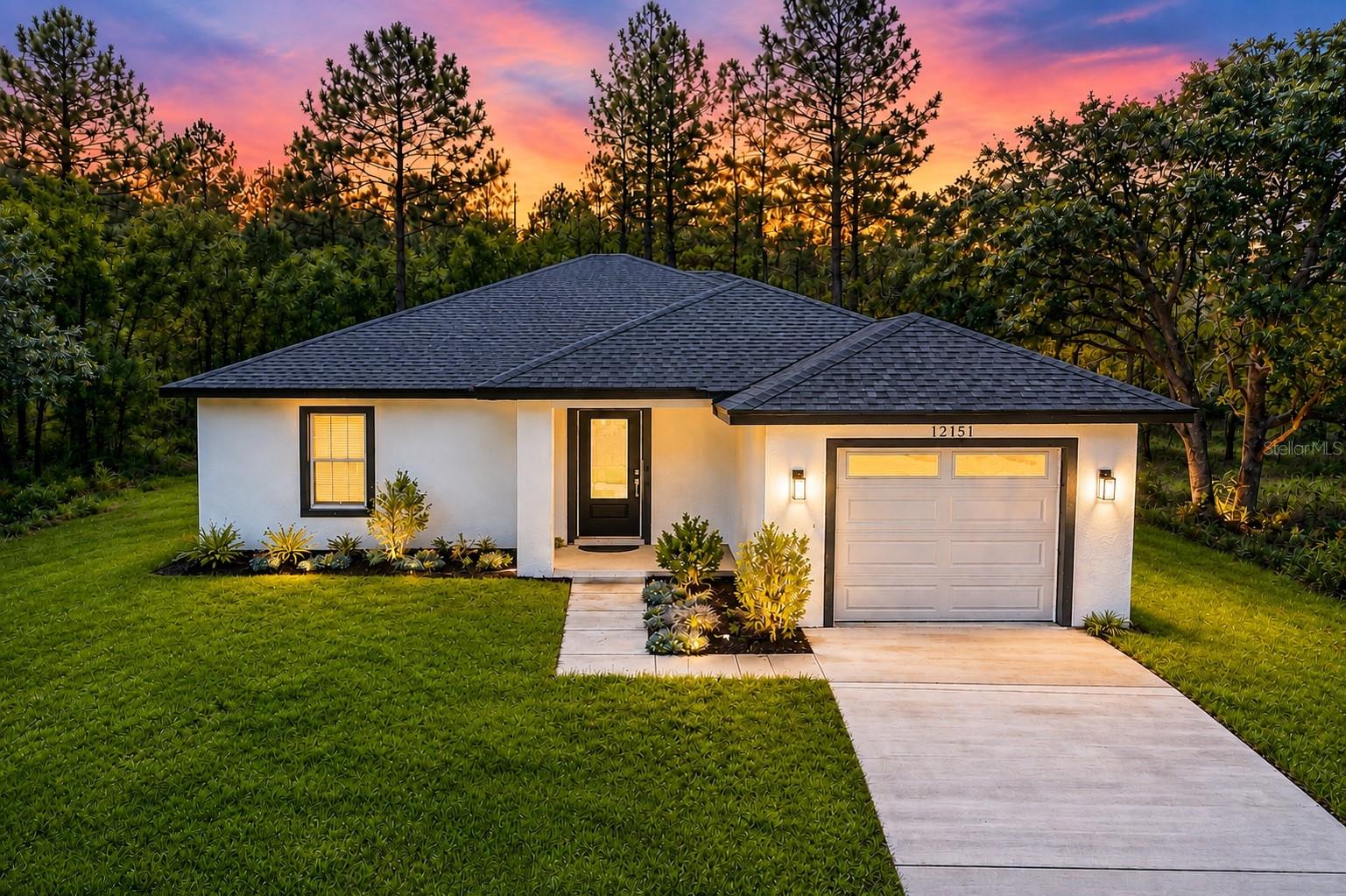 WELCOME TO YOUR OWN BACKWOODS FLORIDA PARADISE! This 2025 built 3-bedroom, 2-bath home with a one-car garage offers so much more than your typical new construction. Tucked away on a quiet dead-end cul-de-sac and surrounded by natural beauty, this 0.46 acre property delivers the peace, privacy, and character of Old Florida while keeping you conveniently close to shopping, restaurants, and everyday necessities. From the moment you arrive, you'll appreciate the property's unique setting. Preserved land borders both sides of the property, providing additional green space and privacy, while a beautiful wooded backdrop creates a peaceful natural view behind the home. Enjoy watching an abundance of Florida wildlife, including native birds, tortoises, and more, right from your own backyard. A full-property security system, irrigation system and storm-drain catchment basin are already in place. Step inside and you'll immediately notice that this isn't your ordinary new construction as thoughtful upgrades can be found throughout. The light and bright open floor plan is designed for both entertaining and everyday living, featuring luxury laminate flooring throughout and an impressive kitchen with beautiful wood cabinetry, granite countertops, stainless-steel appliances, a large pantry, and a spacious breakfast bar overlooking the main living and dining area. The primary suite offers a private retreat with an ensuite bathroom featuring a walk-in shower and a generous walk-in closet. Custom closets and additional storage throughout the home provide excellent organization and functionality. The two additional guest bedrooms are conveniently located and offer light, bright, and comfortable spaces with ample room for family, children, overnight guests, or even a home office. Both bedrooms enjoy convenient access to a beautifully appointed guest bathroom featuring a tub and shower combination, creating a functional and welcoming layout for family and guests alike. Even the laundry has been upgraded with an oversized, top-of-the-line LG front-loading washer and dryer. The one-car garage provides ample space for a vehicle along with additional storage. Outside is where the possibilities really begin. The spacious property provides plenty of room to add a swimming pool, store an RV or boat, or potentially build a detached garage for your vehicles, boat, workshop, or recreational toys. The home is being offered with brand-new furnishings, making this an exceptional opportunity for someone looking for a truly move-in-ready property. Best of all, you can enjoy the feeling of escaping to your own private green-space oasis without giving up access to the conveniences of everyday life. No flood zone, newer construction, beautiful natural surroundings, privacy, wildlife, and room to make the property your own — this is Florida living the way it was meant to be. Beautifully upgraded, surrounded by nature, and ready for its new owner. Welcome home! Call today for a private showing.