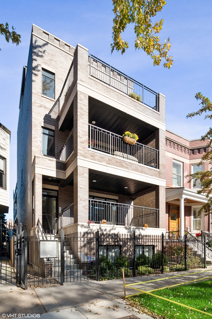 Welcome to 1242 W. Grace, Unit 3-Penthouse. This showstopper is a  needle in the haystack, with nothing like it on the market! The extra wide Penthouse is located in the sweet spot of the Southport Corridor and Wrigley Field. You'll feel and notice the extra width that makes all the difference as soon as you walk in. This 2 bedroom / 2 bath features a Calcutta quartz kitchen island with Wolf range with hood, Sub Zero refrigerator, Bosch dishwasher, and Sharp microwave. Kitchen also features task, accent lighting and pendant lighting with neutral porcelain backsplash and pantry. The wide open living and dining areas offers plenty of room to stretch out and the dining are can  comfortably seat 6. The large front south-facing terrace has plenty of room for outdoor seating complete with a gas line for grilling and electric. The spacious primary suite easily accommodates a king-size bed, features a custom walk-in closet and tastefully appointed bath with natural stone floor and surround, quartz dual sink, oversized steam shower, private water closet, and heated floors. Ample second bedroom serviced by full hall bath with tub and adjacent linen closet.  Interior access to the incredible rooftop deck with pergola by Urban Rooftops that overlooks Wrigley Field, Gallagher Way, and downtown. Penthouse-level interior features a beverage center with dual refrigerators and ample storage. The roof deck features expansive covered seating and grilling area as well as two additional seating areas and rear exterior stair. Impossible to miss the attention to detail: crown molding, solid core doors with beautiful hardware, hardwood floors throughout, wired for sound inside and on roof deck, additional storage and garage parking.  So many wonderful spots to walk retail and restaurants in this vibrant community: The Guild or Krista K; Uncommon Ground or Crosby's Kitchen. Red line at Addison or Brown line at Southport and Roscoe. All this and Blaine school district too!  Super low assessments and strong reserves of $14,234. No planned or upcoming projects. This HOME has been lightly lived in as its a second home for the seller.  Additional Photos are forthcoming.