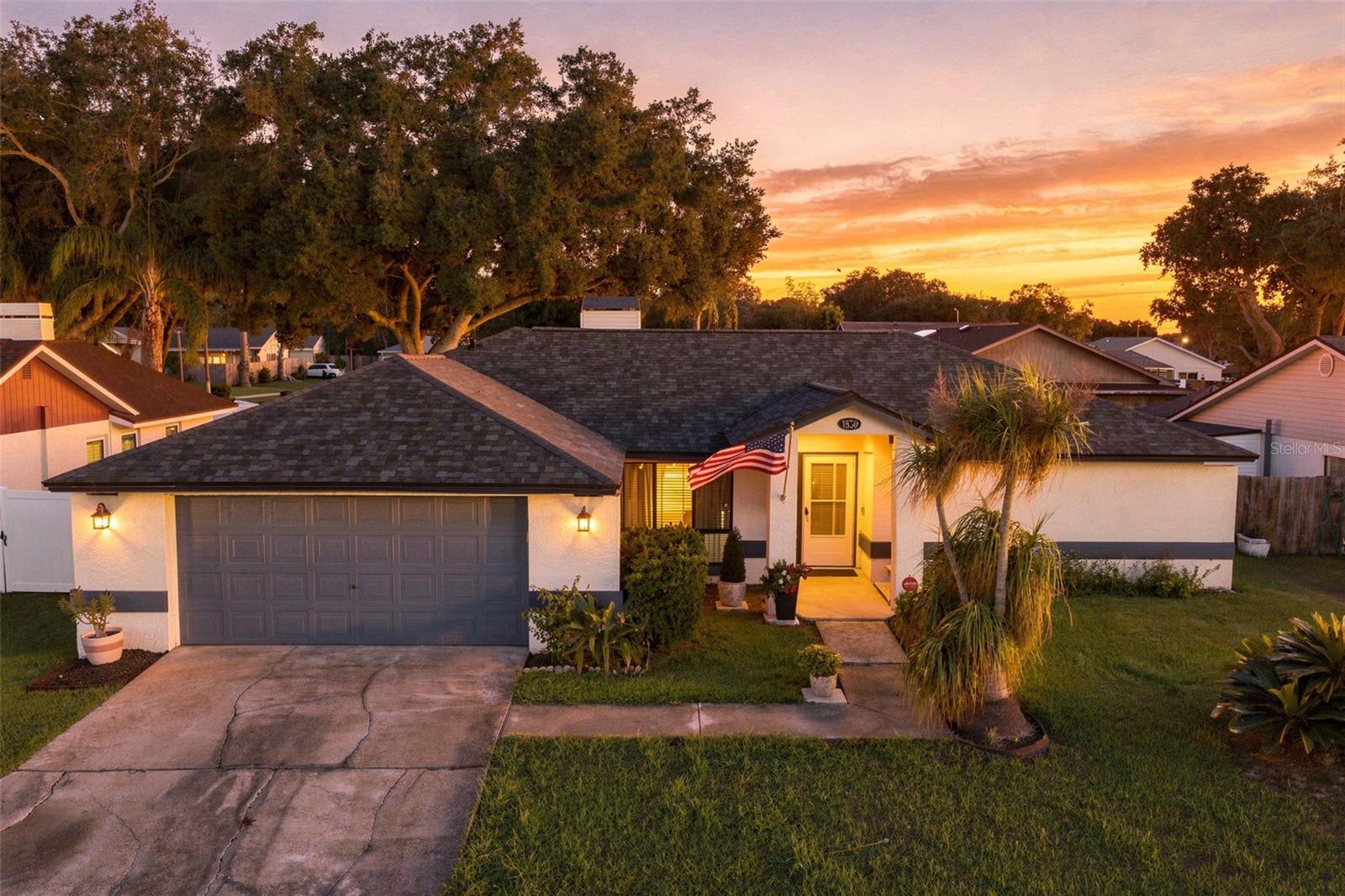 MAKE YOUR MOVE! ENJOY MORE FREEDOM, FAMILY COMFORT, AND ROOM TO GROW! Welcome to this beautifully updated 3-bedroom, 2-bath home in desirable Lakeview Village in Brandon, where inviting living spaces, a spacious homesite, and an unbeatable location create the perfect setting for making lasting family memories! Enjoy the added freedom of NO DEED RESTRICTIONS, LOW HOA FEES, AND NO CDD FEES! This meticulously maintained home offers valuable updates and comfortable spaces for everyday living, family gatherings, and entertaining friends. Major improvements include a NEW ROOF (2025), exterior paint, sliding doors, garage door opener, and bedroom wood-look laminate flooring (2026). Additional updates from 2020–2021 include porcelain tile flooring throughout, stainless steel appliances, washer and dryer, an updated main bathroom shower, and updated bathroom vanities. The electric water heater was replaced in 2023. Step inside and DISCOVER soaring ceilings, abundant natural light, and an open, airy atmosphere. The spacious family room features a beautiful wood-burning fireplace with a handsome hearth, creating the perfect place to GATHER, relax, and enjoy cozy evenings together. The inviting kitchen features modern cabinetry, quartz countertops, stainless steel appliances, and a convenient breakfast bar that opens to the family room, keeping everyone connected during busy mornings and family dinners. A separate formal dining room offers the ideal space to CELEBRATE holidays, host special occasions, and bring everyone together around the table. The desirable split-bedroom floor plan provides added privacy, with the primary suite offering sliding doors to the patio, a generous walk-in closet, dual vanities, and a beautifully tiled tub-and-shower combination. Two additional bedrooms on the opposite side of the home provide flexible space for family members, guests, or a home office and share an upgraded guest bathroom. Step outside and ENJOY the extended patio and fully fenced backyard, offering privacy and space for outdoor dining, weekend barbecues, playtime, gardening, or simply enjoying Florida’s sunshine. Additional conveniences include a spacious laundry room with the washer and dryer and an oversized two-car garage with room for vehicles, storage, and hobbies. Perfectly positioned in the heart of Brandon, this home places you just minutes from shopping, dining, entertainment, schools, and major commuter routes. Downtown Tampa, Amalie Arena, Busch Gardens, and Tampa International Airport are within convenient driving distance, while Walt Disney World Resort, Clearwater Beach, and Sarasota’s beautiful Gulf Coast beaches offer exciting options for family outings and weekend adventures. STOP RENTING YOUR DREAM LIFESTYLE—START MAKING MEMORIES! With major updates, welcoming living spaces, a fenced backyard, and the freedom of no deed restrictions or CDD fees, this Lakeview Village home is ready for you to MOVE IN, MAKE IT YOUR OWN, AND LOVE WHERE YOU LIVE!