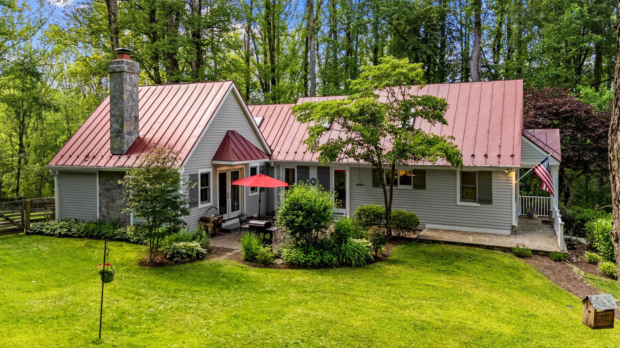 Amazing opportunity to own property along one of Loudoun's most scenic byways. Charming 3BR/2.5BA custom home with vaulted ceilings and exposed beams, hardwood flooring, two fireplaces and inviting outdoor spaces at every turn. Detached oversized two car garage with finished bonus room above offers flexibility of uses--an office, a gym, an extra space for guests or a fun recreation room. Adjoining 2.56 acre lot with idenitified drainfield location requires a boundary line adjustment to make it a buildable lot. This offers even more possibilities, build a second home, a compound or sell it!
