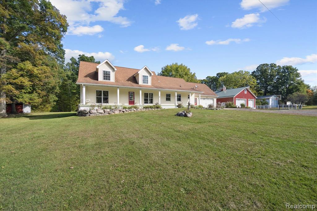 Welcome to your own private retreat on over 18 acres of wooded beauty, complete with winding trails, a peaceful creek, a stunning pond with a fountain, fenced garden area, and apple and peach trees. Outdoor amenities include a chicken coop and a seasonal half-bath house for added convenience.
The property features an impressive setup with the original 36x60 barn heated by an outdoor wood burner while the newly added 40x60 section includes thermostat-controlled in-floor heat, a full bath, and a mini kitchen ~ making it the perfect workshop, storage space, or event barn.  
Inside, you’ll find a warm and inviting layout with a spacious kitchen featuring hickory cabinets, a large dining area, a vaulted-ceiling living room, first-floor laundry, and a main-floor primary suite. Upstairs offers 2 additional bedrooms and a bathroom, while the partially finished lower level adds another bedroom.
The home is equipped with dual heating options: a furnace connected to the outdoor wood burner and a second furnace hooked to propane, giving you flexibility year-round.
An attached garage completes the package, blending function with everyday comfort.
If you're looking for privacy, a one-of-a-kind pole barn and peaceful property ~ come check this one out, you won't be disappointed!
**Property is hunted ~ absolutely no walking the property without a confirmed showing**