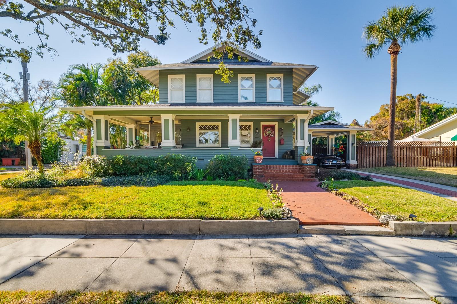 Price reduced $150k. Imagine coming home to a beautiful 1920s Craftsman home nestled in the heart of Historic Hyde Park, all on a generous corner lot! This charming home boasts a sprawling front porch and breathtaking views of the sparkling waters along the iconic Bayshore. Just a short walk away, you’ll find yourself in Hyde Park Village, where you can explore delightful dining spots and boutique shops. Inside, you’ll discover a classic home with gorgeous original hardwood floors, a lovely wood-burning fireplace, and beautiful architectural windows that bring a touch of historic charm. The living room is spacious and bright, with the fireplace as the perfect centerpiece. The home office is designed to make your daily work a pleasure, featuring bead-board ceilings, wood plank walls, large windows, and natural light with amazing views of the waterfront. The formal dining room is the heart of the home, with details like dental crown molding and beautiful artistic windows. The eat-in kitchen is a cook’s dream, complete with a separate bar/wine room, beautiful stone countertops, maple wood cabinetry, abundant natural light overlooking the backyard and swimming pool. Adjacent to the kitchen is a cozy sitting room, ideal for relaxing and watching TV. The downstairs bedroom is perfect for guests and doubles as another wonderful home office. The primary bedroom also offers lovely bay views, a walk-in closet, and a spacious en-suite bathroom with a classic soaking tub and separate shower. The remaining bedrooms upstairs are light and bright, with the back bedroom featuring a bonus room for one lucky person. The full-size laundry room is centrally located, making laundry a breeze with a wash sink, cabinetry, and countertop for folding. Outside, you’ll find a generous-sized backyard with a covered patio and an enclosed TV, perfect for outdoor entertaining by the large swimming pool. This is Hyde Park Living at its finest!