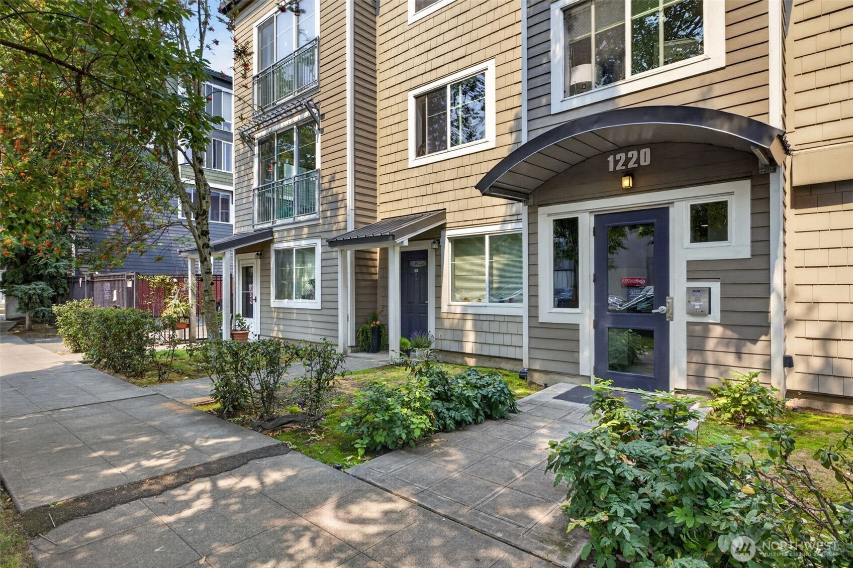 Experience the best of urban living in the heart of First Hill. Tucked away from the bustle, this light-filled, turn-key two-bedroom condo is a peaceful urban oasis. The open-concept floor plan features Juliet sliding doors overlooking a quiet, tree-lined street. The spacious kitchen features stainless steel appliances, a brand-new range, and a newer refrigerator. Both bedrooms are generously sized and complemented by a walk-in closet and a versatile flex space perfect for a home office, den, or additional storage. A newer stacked washer and dryer add everyday convenience.  Recent upgrades include high-end luxury vinyl plank flooring, fresh interior paint, and a newer water heater. Enjoy the convenience of your own private, gated, secure parking space in a well-maintained, pet-friendly building.  Ideally located just steps from Seattle University and Swedish Medical Center, with easy access to the Capitol Hill Light Rail Station, public transit, parks, restaurants, coffee shops, and neighborhood nightlife. Everything you need is just outside your door.