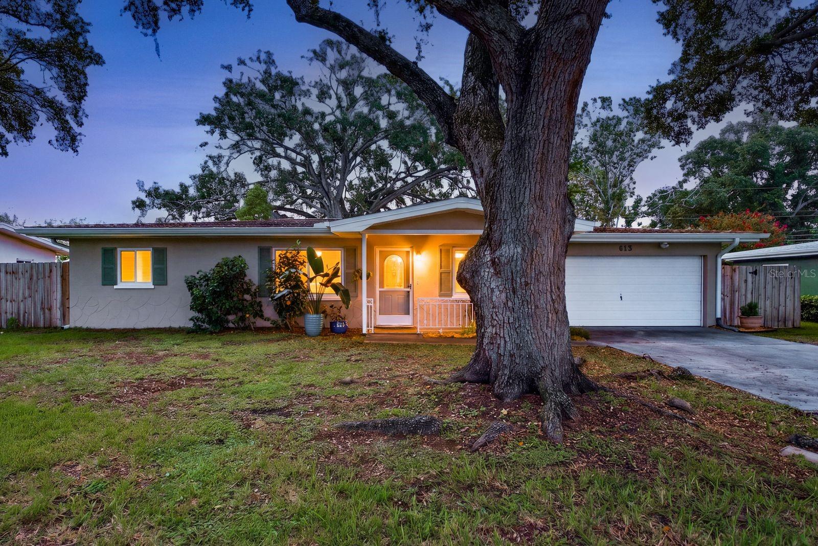 Welcome to 613 Imperial Drive, a beautifully updated home offering a terrific Largo location, thoughtful improvements, and a spacious, fully fenced backyard! Inside, you'll find 1,216 square feet of comfortable living space with luxury vinyl plank flooring flowing throughout. The updated kitchen features granite countertops, a convenient breakfast bar, and a built-in coffee bar—the perfect spot to start your morning or add extra serving space when entertaining. The renovated bathroom includes a newer vanity and an impressively large linen closet offering plenty of additional storage. Beyond the cosmetic updates, many of the big-ticket improvements have already been completed, including a roof (2017), new A/C and thermostat (2022), updated PVC plumbing throughout, gutters (2024), and new windows (2025). The kitchen was remodeled in 2018 and the full bathroom was renovated in 2023. Step outside and discover one of this home's standout features—a large, fully fenced backyard with plenty of room for pets, play, gardening, entertaining, or simply enjoying the Florida lifestyle. A backyard patio added in 2024 provides the perfect place for outdoor dining, grilling, or relaxing at the end of the day. Situated on a .18-acre lot in a convenient central Largo location, this home offers easy access to shopping, dining, parks, recreation, and everything Pinellas County has to offer. With an extensive list of updates, inviting indoor spaces, and a backyard you'll truly appreciate, 613 Imperial Drive is ready to welcome its next owner!