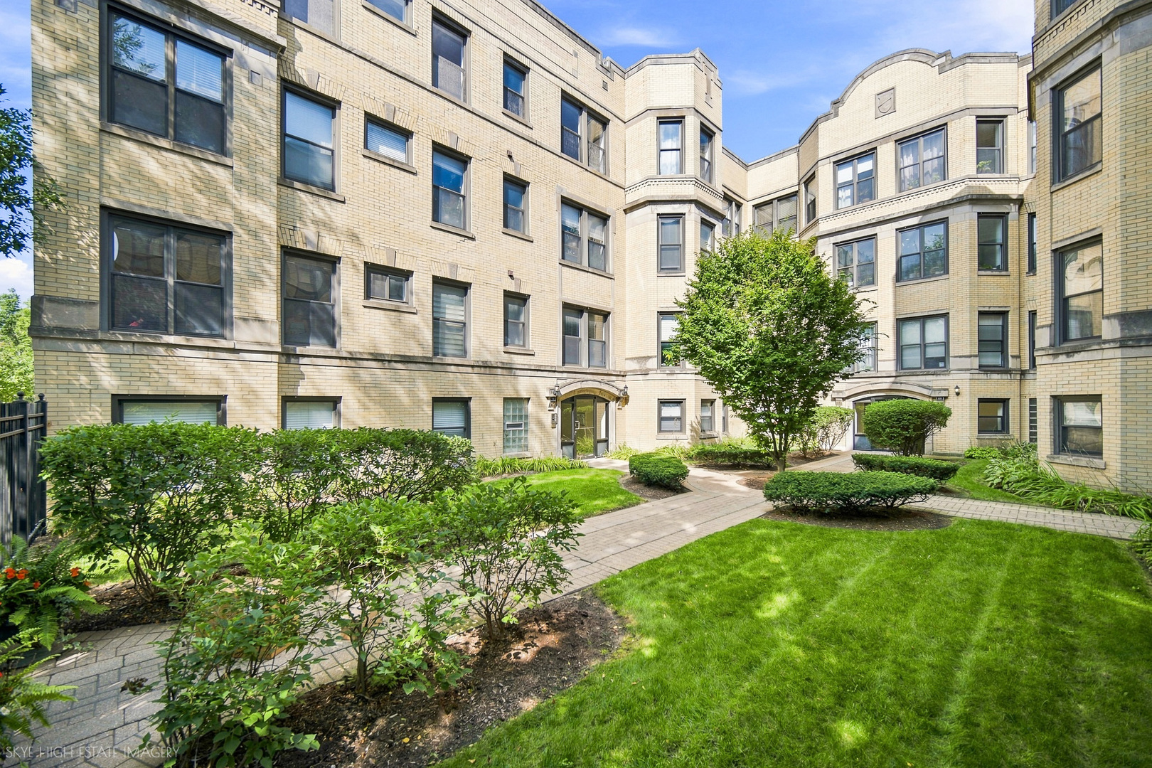 Welcome to The Heritage on Drexel, where space, sunlight, and an exceptional Hyde Park location come together! This beautifully maintained, predominantly owner-occupied condominium building offers a quiet residential setting just steps from the University of Chicago campus.  Located on the top floor, this spacious 2-bedroom home is filled with natural light from an abundance of oversized windows. The expansive open-concept living and dining areas provide plenty of room to entertain, relax, and work from home. Fresh paint and beautiful hardwood floors throughout give the home a bright, polished feel.  The generously sized kitchen opens directly to the main living space and features abundant cabinetry, granite countertops, a large center island with seating, stainless steel appliances, dishwasher, and a brand-new refrigerator. Both bedrooms are impressively sized with excellent closet space, while in-unit laundry and central heating and air conditioning provide the everyday conveniences buyers are looking for.  The building has also been enhanced with brand-new rear porches and offers a large dedicated basement storage space, shared bike room, well-maintained common areas, low HOA fees, and healthy reserves.  The location is hard to beat! A University of Chicago shuttle stop is conveniently located at the corner, with coffee shops, restaurants, parks, public transportation, and express buses to downtown all nearby. Enjoy everything that makes Hyde Park one of Chicago's most desirable and vibrant neighborhoods.  Spacious, sun-filled, move-in ready, and ideally located-this is Hyde Park living at its best!