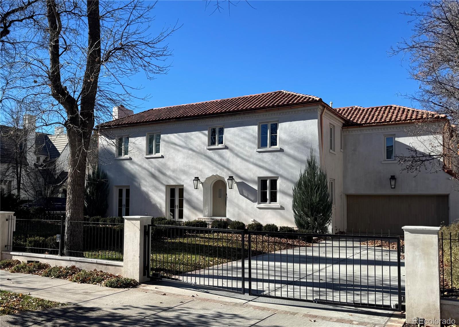 Nestled on one of the most coveted streets in the historic Denver Country Club neighborhood, 181 Race street is a breathtaking residence that is a true rarity—an architectural masterpiece with every detail that has been meticulously curated to balance exquisite form with effortless function. Completely reimagined and updated to the highest standard, the home unfolds across a generous lot bathed in natural light. Soaring windows frame mature trees and manicured grounds, drawing the eye through airy, light-filled interiors that blend timeless elegance with understated modern sophistication. From the moment you cross the threshold onto the reclaimed European antique limestone floors, you can’t help but notice the attention to detail . Hand-selected finishes, custom millwork, and a restrained yet unmistakable grandeur create a sense of calm luxury that invites you to slow down and enjoy life. This is not simply a home—it’s an experience few properties ever achieve. Quietly set within Denver’s premier neighborhood, just a stones throw from the world class dining, shopping and excitement of Cherry Creek North  all with the added benefit of dedicated neighborhood patrols, this amazing home offers serenity,  coveted location and peace of mind. Opportunities like this arise only once in a generation. Step inside, and you’ll immediately understand why this residence stands apart.