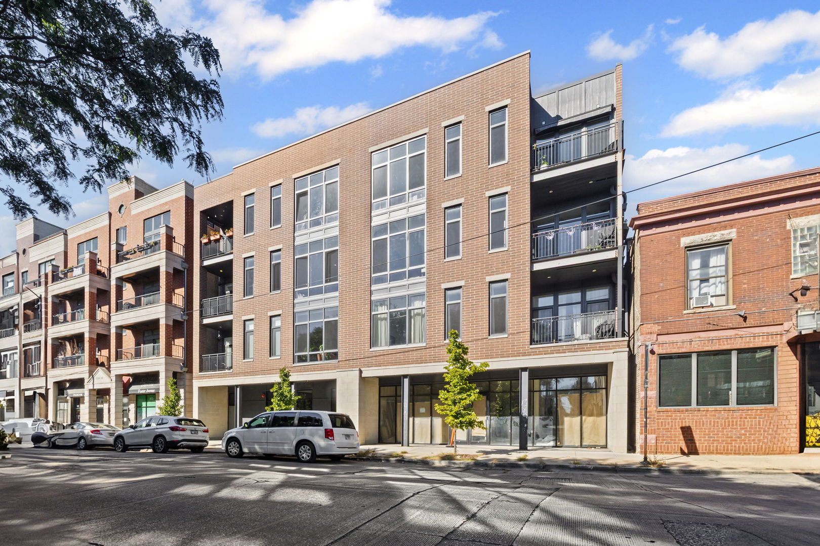 A truly rare find between Lincoln Square and Andersonville, The Foster is an intimate 9-unit elevator building, ideally situated steps from 22-acre Winnemac Park, and walking distance to the best restaurants, bars, and shops that each neighborhood has to offer. This BETTER THAN NEW 3-bedroom, 2-bathroom unit features a warm modern design aesthetic, with white oak flooring, FLOOR-TO-CEILING windows, floating bathroom vanities, frameless glass showers, and a quartz waterfall island in the kitchen. Meticulous owners have added nice upgrades, including electronic shades and custom closets. With an incredible amount of storage and side-by-side washing machine/dryer, this unit is a perfect 10. Secured parking space must be purchased with unit- $15,000. Amundsen HS!