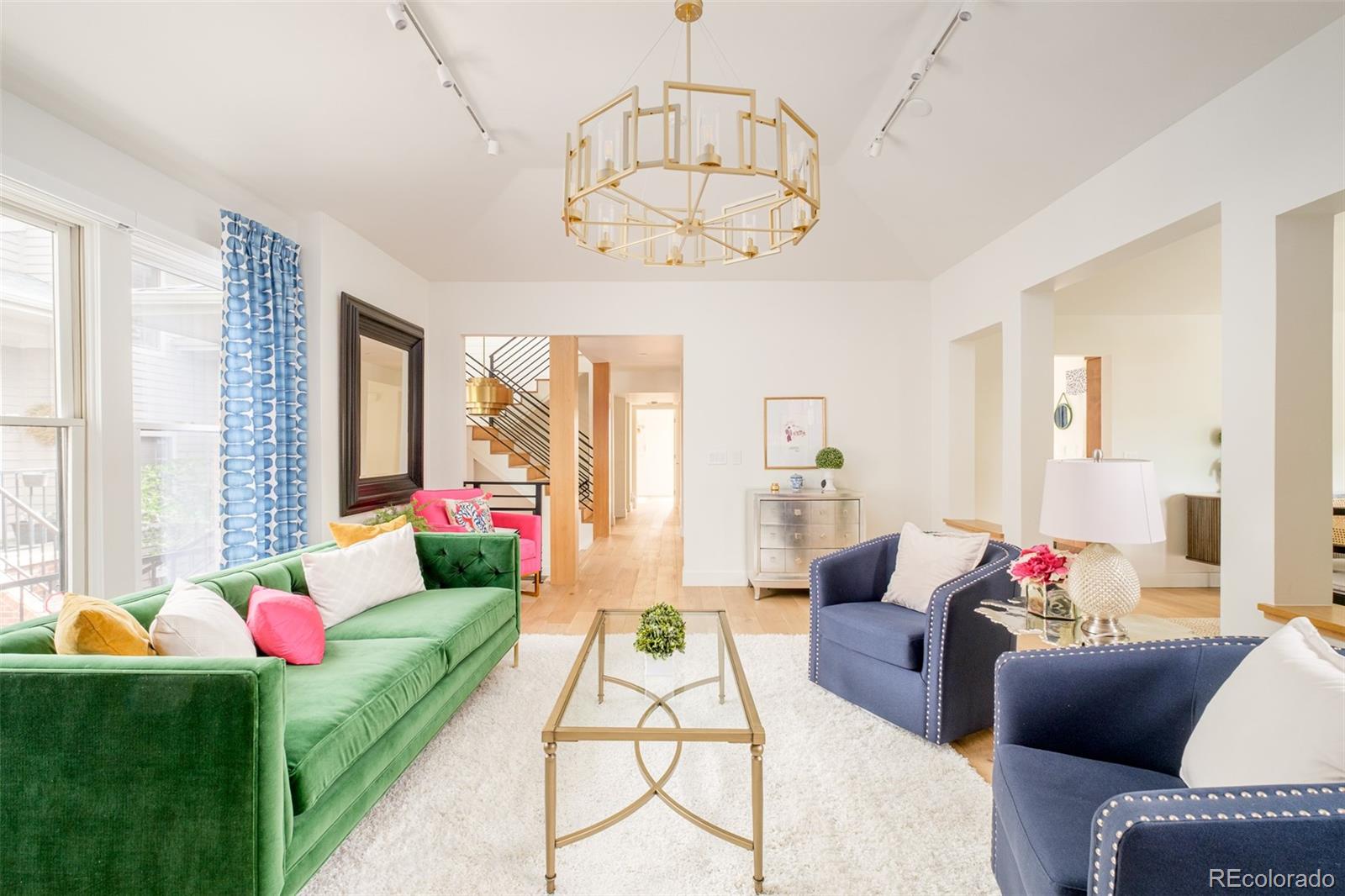 Tucked within one of Cherry Creek North’s most peaceful residential enclaves, this extensively redesigned home offers a compelling alternative to traditional luxury condominium living. Combining the comfort and privacy of a detached residence with the convenience of a lock-and-leave lifestyle, the property has been meticulously renovated in 2024 with a focus on timeless design, modern functionality, and elevated craftsmanship. At the center of the home, the chef’s kitchen balances striking aesthetics with everyday practicality. Custom cabinetry, quartz countertops, a Wolf induction range, and premium KitchenAid appliances create a polished yet highly functional space designed for both entertaining and daily living. Natural light fills the adjacent breakfast area, while the open-concept dining and living rooms provide an inviting atmosphere anchored by a classic fireplace. The thoughtfully designed floor plan prioritizes comfort and separation, featuring two spacious ensuite retreats on different levels. Upstairs, the primary suite feels like a hotel escape, complete with a spa-caliber bath and an oversized dressing room. A second ensuite bedroom on the main level offers exceptional flexibility for guests, multigenerational living, or a refined work-from-home environment. One of the home’s standout features is the expansive rooftop terrace, an uncommon offering that creates a true outdoor extension of the living space, ideal for entertaining or quiet evenings above the city. Practical upgrades include a new high-efficiency HVAC system, central air conditioning, and an attached two-car garage, while the self-managed HOA delivers low-maintenance ownership. Located just moments from the energy of Cherry Creek North, residents enjoy immediate access to acclaimed restaurants, boutique shopping, galleries, and neighborhood cafés.