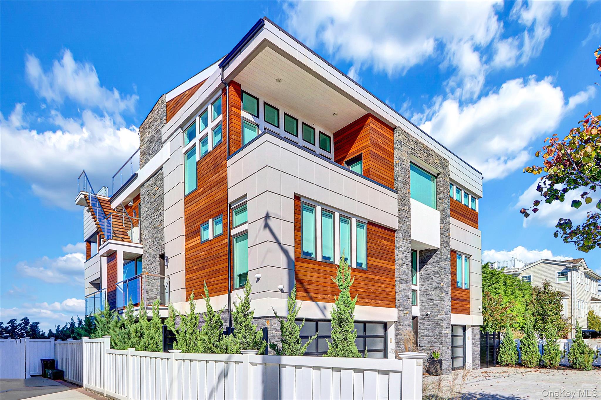 *Point Lookout Long Island - Brand New Reynolds Channel Waterfront Estate | Never Lived In *WATCH FULL VIDEO VIRTUAL TOUR* 
Introducing a All Brand-New, never-before-lived-in Four-level Waterfront Masterpiece Perfectly positioned along Reynolds Channel. Set on a 6,000-square-foot property with 60 feet of Premium Waterfront, this Architectural Gem showcases a New bulkhead and New Private dock—a True Boater’s Paradise.
Spanning an impressive 5,248 square feet of refined living space, this Estate features 5 Spacious Bedrooms, 4.5 Designer Baths, and an Elevator seamlessly connecting each level. The elegant formal Dining room and Chef’s kitchen are designed for grand entertaining, while expansive living areas frame sweeping, Unobstructed Water Views that captivate from Sunrise to Sunset.
A 3-car garage plus additional parking for up to 9 vehicles provides exceptional convenience. Outdoors, indulge in resort-style amenities including a New Hot Tub, 2 built-in Barbecue areas, and a Heated rooftop deck with Great Views including NYC—the ultimate retreat for luxury Coastal Living.
Every inch of this Brand-New Waterfront residence embodies Sophistication, Craftsmanship, and Tranquility, offering a once-in-a-lifetime opportunity to experience modern elegance on the water. This Waterfront property has Rights to the Point Lookout Play Ground and the Residents Ocean Beach Front.