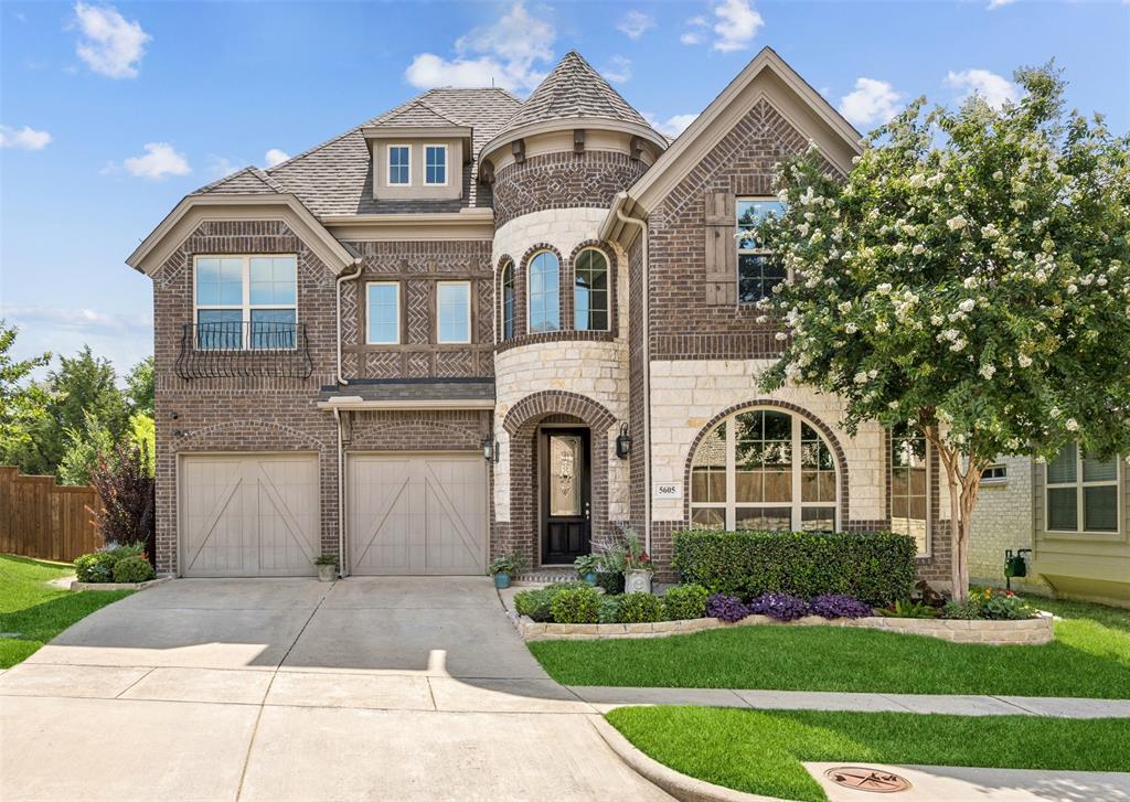 Located in the highly desired and amenity-rich Tour at Craig Ranch, this extraordinary energy-efficient home blends timeless elegance with modern upgrades. The gorgeous stone and brick exterior offers stunning curb appeal, setting the tone for the exceptional interior. Built with meticulous attention to quality and detail, this home is filled with upscale finishes and thoughtful upgrades. At the heart of the home is a dramatic living room with soaring ceilings and a wall of windows that flood the space with light. The gourmet kitchen features extensive cabinet and counter space, a center island and a butler’s pantry. Quartz countertops throughout the home.  The open-concept layout is ideal for entertaining and multi-generational living, featuring a primary suite and a secondary bedroom with a full bath on the main level. Upstairs includes three additional bedrooms, each with its own bathroom, plus a sunlit loft and a spacious bonus living area. Energy-efficient is paramount with a 10kW solar panel system, 3M solar film on approximately 70% of the window to reduce heating and cooling costs, upgraded Span Smart electrical panel, whole-home water softener, and filtered water dispenser. Private network infrastructure includes three access points, a router, and a gateway. It’s ready for cable, fiber, or Welink internet. Sprinkler system, garage doors, door locks, security cameras, ceiling fans, lighting, electrical panel, and solar array are all remotely accessible and managed via phone or computer.  Located within Frisco ISD.  Easy access to premier community amenities!