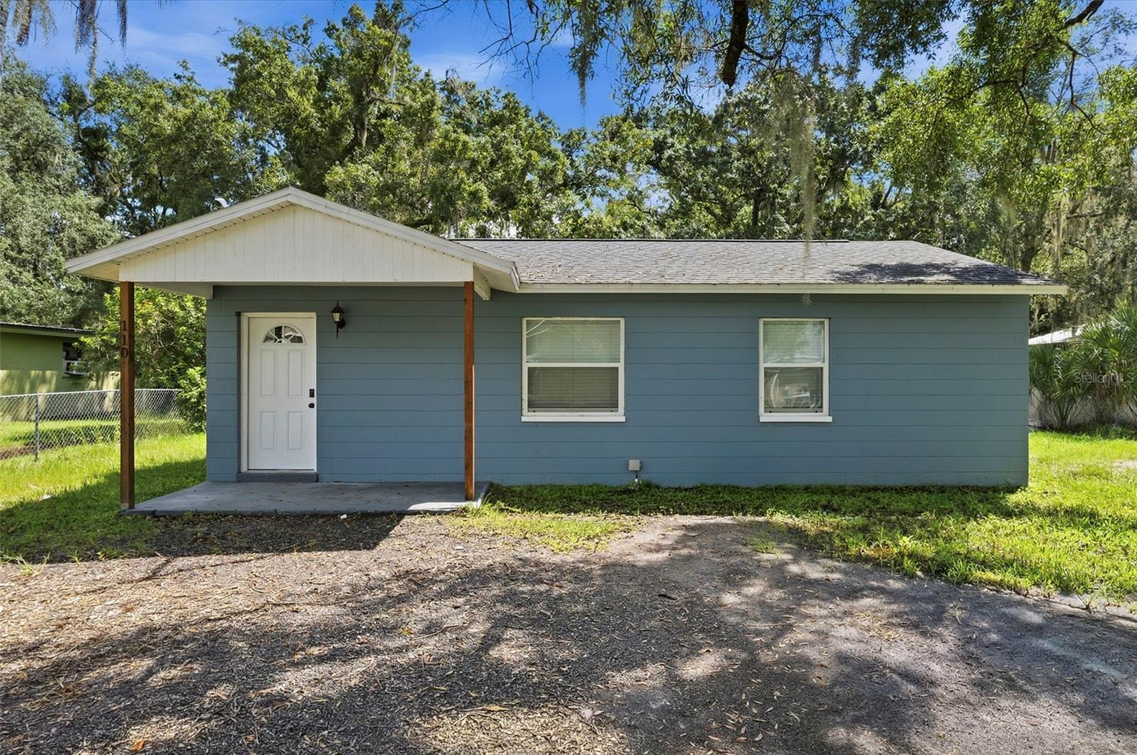 Virtually Staged. Exceptional opportunity to own a completely renovated, move-in-ready home situated on a spacious lot in Plant City. This beautifully updated 2-bedroom, 1-bath home offers a bright and open-concept layout with generous living space and modern finishes throughout. The kitchen serves as the centerpiece of the home, featuring shaker cabinetry, quartz countertops, a large peninsula with plenty of space for seating, modern fixtures and hardware, and pendant lighting overlooking the main living area. Luxury vinyl plank flooring flows throughout the home, while fresh neutral finishes and multiple windows create a bright, clean, and inviting atmosphere. The fully renovated bathroom features classic subway tile, an updated vanity, and coordinating fixtures for a modern touch. Beyond the cosmetic updates, several major improvements have already been completed, including a new A/C system in March 2023, roof in October 2022, complete re-plumbing in December 2022, and water heater in March 2021, offering added peace of mind for the new owner. Outside, the generously sized lot provides plenty of room to create the outdoor space you envision, along with added privacy and flexibility. With no HOA or CDD, you’ll have even more freedom to make the property your own. Conveniently located near Downtown Plant City with easy access to shopping, dining, and major roadways. With the renovations already complete and major systems updated, this home is ready for its next owner to simply move in and enjoy. Schedule your private showing today!
