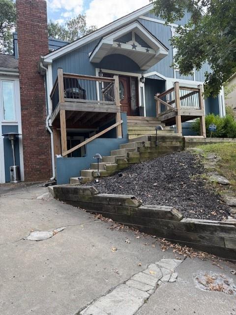 Nestled in a wonderful, established area with lake views nearby, easy access to Hwy 291 and I-70 for commutes, and top-rated schools in the Lee's Summit and Blue Springs districts. Sold as-is—a true fixer-upper that needs TLC (think fresh paint, updated flooring, and cosmetic updates to restore its original charm. With over 3,900 square feet (built in 1976), this raised ranch-style home offers spacious living areas that have potential for a multi-level appeal.