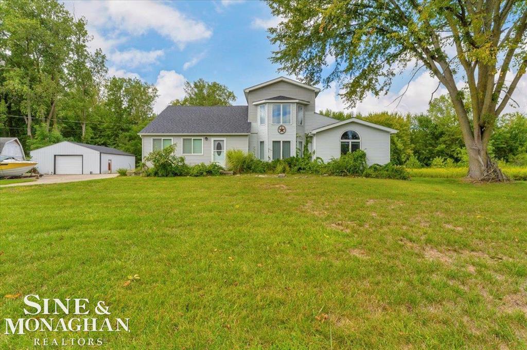 Owner will now consider a land contract/rent to own. ALMOST 35 ACRES! PAVED ROAD! PUBLIC WATER & SEWER! ANCHOR BAY SCHOOLS! PLEASE NOTE while scrolling at this stately 3000 + sq ft, 4 Bedroom, 3 Bath home, that the taxes reflect a non homesteaded tax rate. If this is to be your primary home, your taxes will be MUCH lower! This is the property with ENDLESS opportunity. Hunter, Investor, Developer, Nature Lover, this is an investment you do not want to let pass you by. Detached Garage, Insulated Poll Barn with High Ceilings and Extra Voltage Power and Shed are a BONUS. All stainless appliances stay with the home as well as the BRAND NEW washer and dryer. Security System is included as well. New roof in 2019. A Cadet 360 Lawn Mower. All of this Located just a mile from Lake St. Clair and a mile to Dixie Highway. Schedule your showing today!!