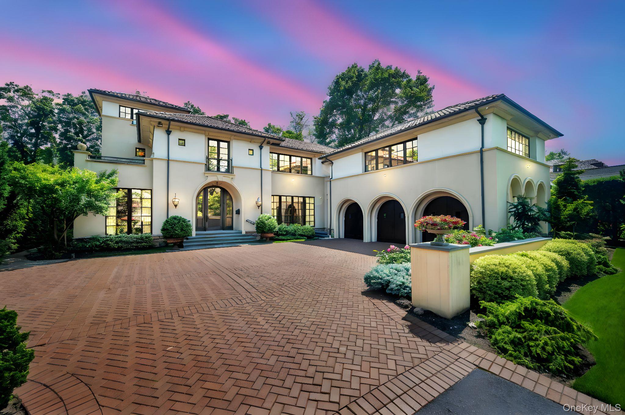 Welcome to an exquisite custom-built masterpiece nestled at 48 Nassau Drive in the prestigious Village of Kensington in Great Neck, NY. This luxurious residence, constructed in 2010, offers an unparalleled living experience with an impressive 6,938 square feet of meticulously designed space on a sprawling half-acre lot.

Upon entering, you are greeted by an expansive foyer that sets the tone for the grandeur throughout. The first floor boasts a formal dining room, a sophisticated formal living room featuring a serene home aquarium, and a warm, inviting den. Culinary enthusiasts will revel in the eat-in chef's kitchen, while the stately library offers a quiet retreat. An extraordinary highlight is the indoor pool, ingeniously designed with sides that can open to the beautifully landscaped gardens, creating a seamless blend of indoor and outdoor paradise. 

Ascend to the second floor, where you will discover a primary suite that defines luxury living. This personal sanctuary features a large walk-in closet, a lavish bathroom, a private balcony, and a home office. The floor includes an additional four spacious bedrooms with en suite baths. A generously sized bonus room offers unparalleled versatility and refined comfort. Whether you envision a lavish guest bedroom, an executive-style home office, a vibrant playroom, or media retreat, this space adapts seamlessly to your lifestyle.

The fully finished basement is an entertainment haven, complete with a bedroom and full bathroom, a state-of-the-art home gym, a billiards room with a wet bar, a well-appointed laundry room, and a den. The residence also offers the opportunity to incorporate an elevator. The property is complemented by a three-car garage.

With sunlight gracefully flooding through its spaces, this home epitomizes elegance and comfort. 

Option zone for Middle and High School. Pre approval or proof of funds required to schedule showing. Private showings only.