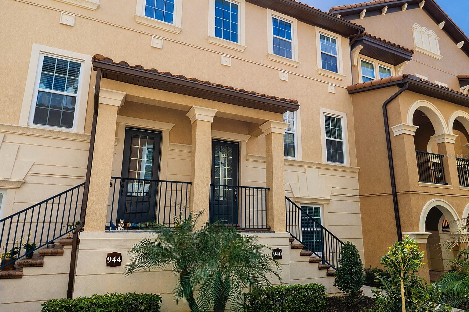 One or more of the photo(s) have been virtually staged. NEW PRICE IMPROVEMENT!! Welcome to this beautiful property located in the guard-gated community of Fountain Parke in Lake Mary. From the moment you walk in, the layout feels open with lots of light. This three-story townhouse offers 4 bedrooms and 3.5 bathrooms with over 2,100 square feet of well-designed space. The main living area sits on the second floor, where the kitchen, dining, and living spaces come together around an oversized island, granite countertops, and stainless steel appliances.The primary bedroom and additional bedrooms are located upstairs.  On the first floor, a separate bedroom and bathroom has a flexible space for guests, working from home, or multi-generational living with its own separate entrance and exit.A two-car garage and low-maintenance exterior make day-to-day living simple. Residents enjoy access to a resort-style pool, fitness center, tennis courts, dog park, pickleball and 24-hour guard-gated entry.Conveniently located near I-4, shopping, dining, and top-rated Seminole County schools.Showings available upon request.