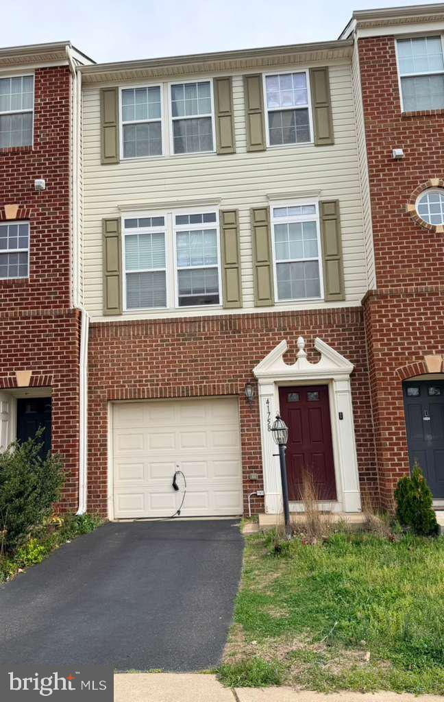 Beautifully updated three level townhome in sought-after Kirkpatrick Farms. This light-filled home offers an open, flowing floor plan with thoughtful updates throughout. Thelower-level features newer LVP flooring in the entryway, new carpet on the stairs,garage access, and a spacious unfinished area with endless possibilities, perfect for ahome office, playroom, movie/game room, additional bedroom, or future finished livingspace. Plumbing is already in place for a full bath, and the walk-out lower-level leads toa fully fenced rear yard.The main level showcases brand new LVP flooring, a fabulous eat-in kitchen with brand-new quartz countertops, new appliances, abundant natural light, and sliding doorsleading to future deck potential with beautiful open space views. The spacious familyroom offers the perfect setting for relaxing or gathering with friends and family.Upstairs, you’ll find three bedrooms and two full baths, including a primary suite withvaulted ceiling, walk-in closet, and a newly added fan/light fixture.Located in the coveted Loudoun County school district and zoned for PinebrookElementary, Willard Middle, and Lightridge High. Conveniently situated near DullesLanding Shopping Center, Dulles International Airport, Braddock Road, Route 50, Route606, and Route 15.Recent updates include kitchen renovation with brand new appliances, new carpet,interior paint throughout, primary bedroom fan/light fixture, and four replaced doors, allin 2026. Roof 2009 and inspected in 2025, deemed to be in great condition. HVAC andwater heater 2009.