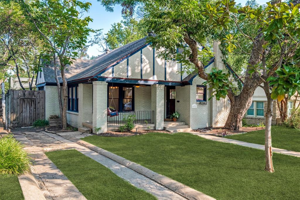 Great opportunity in the highly sought after neighborhood of Hollywood Heights with income potential via short or long term rental of the Guest House. This is a rare find with 2284 square feet of total living space with a separate Guest House.  Known as The Tree House, this remarkably stylish 2017 Brian Gream built 440 sq ft Guest House floats above the lot and is accessed by a bridge from the back deck.  The Tudor main house is accessed through a large front porch and features walls of windows that flood this home with natural light.  Open concept Living and Dining with a separate living area that connects to the kitchen.  Large bedrooms, hardwood floors throughout, walk in closets, and original details.  Stunning 1930's stained glass front cabinets in the kitchen and second living area.  Jack and Jill bath between 2 bedrooms and a back deck for entertaining.  Located close to White Rock Lake, Lakewood Country Club, Santa Fe Hike & Bike Trail, Baylor Medical District, Central Business District, major highways, and all the shopping and dining Lakewood is known for. This is a special home that offers numerous possibilities for growth down the road. Lakewood Elementary