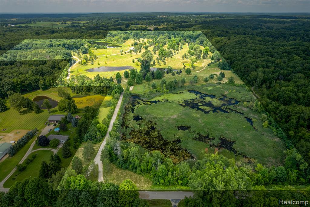 Over 120+ Acres of Rolling Hills This Property boats with Spring Fed Ponds loaded with Fish, Deed Abound, A Hunter's Paradise!!! There is a 2 Bedroom/ 2 Bath House on the Property, 2 Pole Barns, and a Club House.  
Formerly a Golf Course... Seller SAYS Bring OFFERS - Land Contract IS Available!!!!
