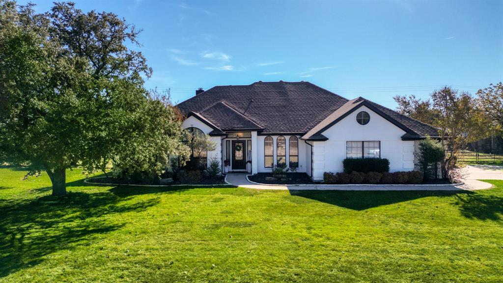 This beautifully updated home is truly move-in ready and perfectly located in the highly desirable Aledo ISD, offering a fresh and modern feel from the moment you arrive. Recent improvements include a brand-new water heater, new carpet, and fresh interior paint throughout the entire home, creating a clean and inviting atmosphere. The exterior has also been upgraded with new paint, enhancing curb appeal and long-term durability. Enjoy a refreshing pool complete with a new pump for added efficiency, along with a backyard batting cage that provides a unique recreational space for training or family fun. Inside, the remodeled bathroom features updated finishes and a contemporary look, while updated light fixtures add a bright, stylish touch to every room. The garage boasts a professionally epoxied floor for durability and a polished appearance. With thoughtful upgrades at every turn and access to one of the most sought-after school districts in the area, this home delivers comfort, convenience, and standout amenities that make it an exceptional opportunity for buyers looking for a well-maintained property with modern features in a prime location.