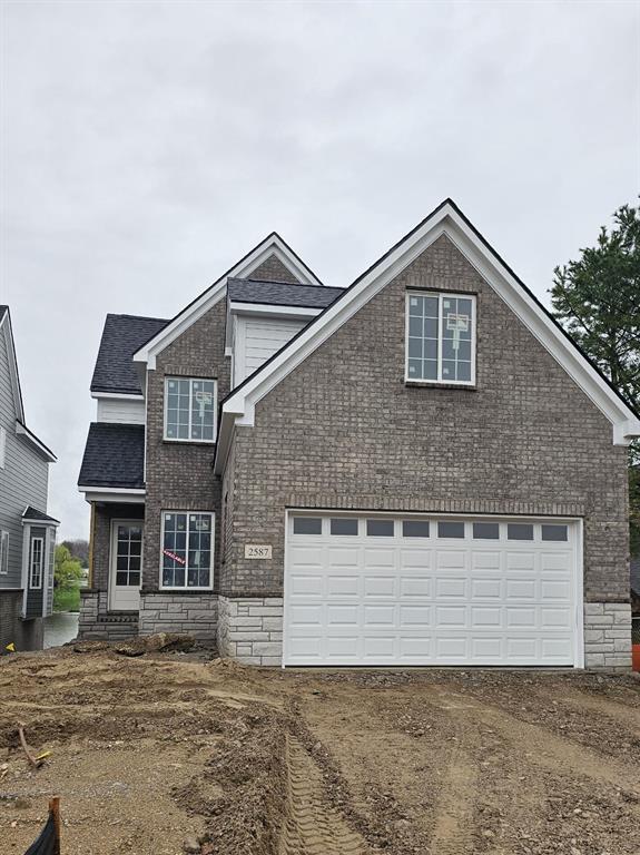 This elegant home offers 3 bedrooms and 2 1/2 baths, including a study on the main floor. A spacious loft adds exceptional versatility, perfect for a secondary living area, private home office, or upscale media or playroom.The home highlights include a custom stone front elevation, full walkout basement, and an open-concept floor plan ideal for entertaining. The home is finished with 10' first-floor ceilings,Trex deck off the rear of the home, and designer landscaping package with irrigation system. The custom kitchen showcases quartz countertops, full built in kitchen cabinets with high end Viking (or equivalent) appliance package. The luxurious primary suite features a marble bath with an elegant freestanding soaking tub and walk in shower along with a custom walk-in closet with shelving organization.