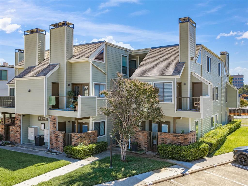 Enjoy a central Fort Worth location with the ease of condo living in this 2-bedroom, 2-bath residence at the gated University Park Condominiums. The two-story floor plan offers generous living space highlighted by vaulted ceilings, large windows, neutral finishes, ceiling fans & easy-care flooring throughout the main living areas. A fireplace creates a focal point in the living room, while the adjoining dining area provides a natural setting for meals & entertaining. The kitchen is equipped with white cabinetry, granite countertops, stainless steel appliances, tile flooring, a breakfast bar, and abundant workspace & storage. Both bedrooms offer comfortable proportions, walk-in closets & ensuite bathrooms for added privacy and convenience. The primary suite also includes a spacious vanity area & ample closet storage. Storage is thoughtfully incorporated throughout the condo, including a private storage closet located off the balcony. One reserved parking space is included. University Park Condominiums provides gated access, beautifully maintained grounds, mature trees, evening lighting & a community pool with a separate spa area & surrounding lounge space. The condo setting offers a convenient, low-maintenance lifestyle with outdoor amenities just steps from home. The location places many of Fort Worth’s best-known destinations within easy reach. Enjoy convenient access to the Fort Worth Cultural District, West 7th, UNT Health Science Center, downtown Fort Worth, restaurants, coffee shops, retail, museums & entertainment. Nearby destinations include Dickies Arena, the Fort Worth Botanic Garden, Modern Art Museum of Fort Worth, Kimbell Art Museum & Fort Worth Zoo. For time outdoors, Trinity Trails offers nearby opportunities for walking, running & cycling along the river. Quick access to major roadways further connects this condo to destinations throughout Fort Worth. Freshly painted walls, ceilings & Kitchen cabinets, plus new carpet installed upstairs October 2026!