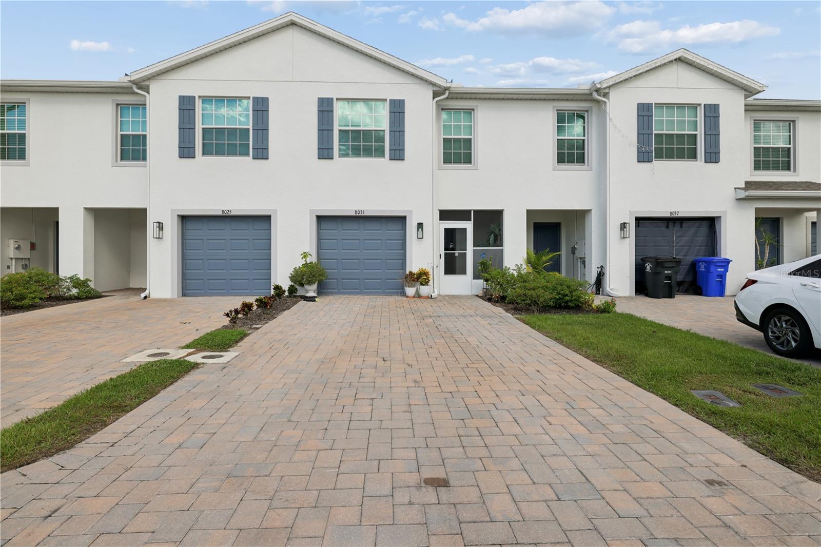 Absolutely beautiful 2 year old townhouse on a cul-de-sac in Asher Park available for sale. This is one of the largest townhouses in the neighborhood. Unit has stainless steel appliances plus a washer and dryer that all stay. Quartz countertops with tile backsplash, shaker cabinets, large island with eat-on countertop and a tiled knee-wall. Downstairs has a half bath and there are two full baths upstairs. Kitchen has a walk-in pantry and there is a walk-in storage pantry as well plus a storage closet under the stairs. Upstairs offers a huge owner's suite with en-suite bathroom and a spacious walk-in closet. There is a small loft on the upstairs landing as well. There are two additional bedrooms upstairs plus a full bathroom. The laundry closet is located upstairs. Sliding doors lead to the screened in lanai that overlooks the serene lake with a fountain. Furnishings are negotiable.