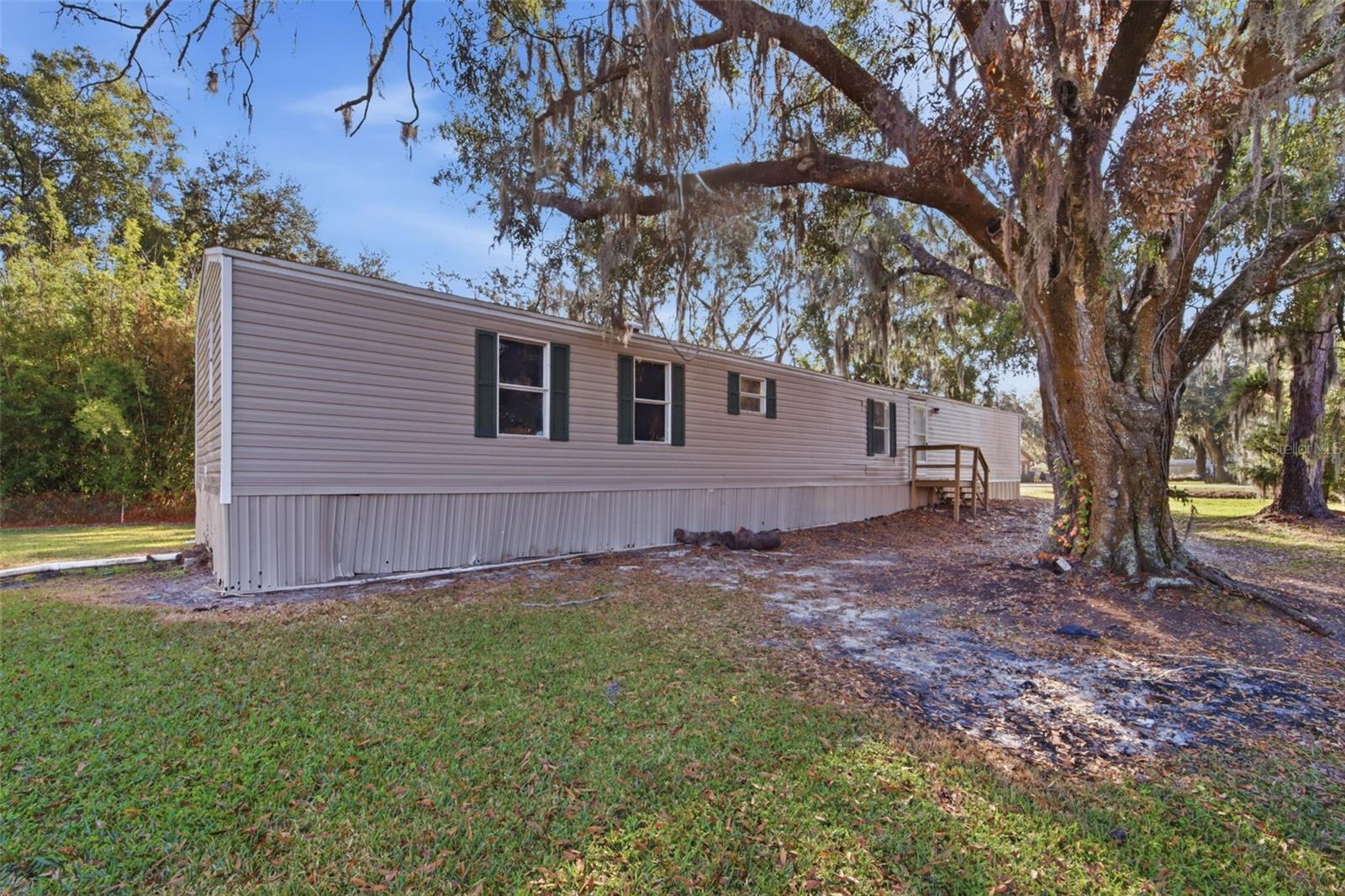 Discover peaceful living in this charming 3-bedroom, 2-bathroom Plant City home. Built in 2000 and set on just under ½ an acre, this property offers the space and tranquility so many buyers are seeking. Major updates are already done for you, including a newer roof (2019), brand-new AC (2025) and recently serviced septic system. With a functional layout and a spacious yard full of potential, this home is ideal as a smart first purchase or a strong rental addition to your portfolio. Low maintenance, great location, and incredible versatility. Schedule your private showing today!