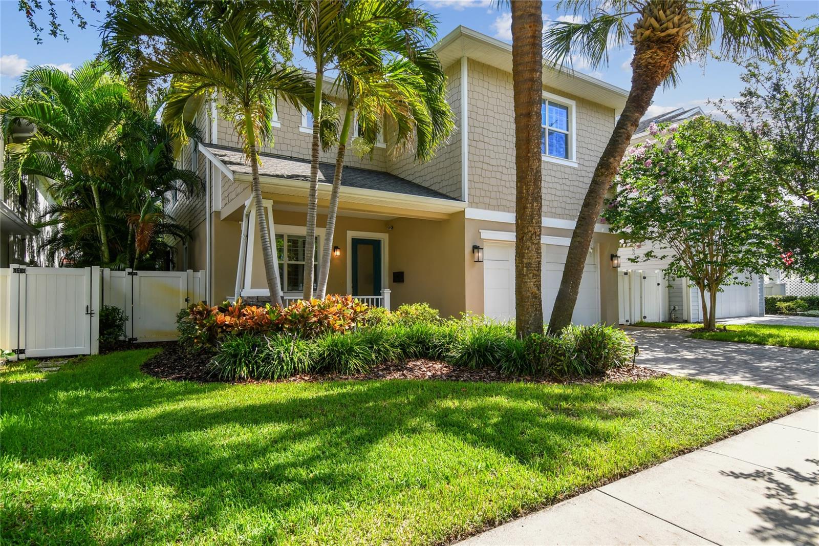 Situated just three blocks from iconic Bayshore Boulevard and steps from the lively shops and restaurants along MacDill and Bay to Bay, this beautifully-crafted 5-bedroom, 4-bathroom, 2-car garage home offers timeless style and exceptional comfort in South Tampa’s coveted Palma Ceia neighborhood. Built in 2015 by Barritz Builders, the home welcomes you with a covered front porch and an expansive open floor plan featuring 10-foot ceilings, a formal dining room, and a custom built-in entertainment center. The gourmet kitchen is designed for both entertaining and everyday living, complete with a large quartz island, stainless steel appliances, gas cooktop and oven, auto-close cabinetry, and an oversized walk-in pantry with custom shelving. Glass sliders open to the screened lanai and pool area, where a heated spa, waterfall feature, LED lighting, and lush landscaping create a year-round outdoor oasis. A surround sound system throughout the main floor living areas and lanai enhances the luxurious setting whether entertaining or unwinding. A first-floor guest suite or office offers private access to the pool through French doors and is conveniently located next to a full bath with high-end porcelain tile and generous glass-enclosed walk-in shower. The wet bar/coffee station with beverage fridge and cabinet storage offers additional high-end refinements and functionality. The second floor includes four spacious bedrooms with custom closets, three full baths, and a large laundry room with built-in cabinetry and utility sink. The primary suite boasts a spa-like 5 piece bath with a soaking tub for relaxing, a glass-enclosed shower, split vanities, and a expansive custom walk-in closet and dressing area with a built-in shelving system. Built with quality and durability for peace of mind, the home features block construction, a hurricane-rated garage door, Hardie shake cement fiber siding, brick paver driveway and porches, and a full security system with cameras at both the front and rear of the home. Interior finishes include hand-scraped hardwood floors, 8-foot solid wood doors, maple stairs, and elegant crown molding throughout. Additional amenities include two tankless gas water heaters, a dedicated electronics closet, and a whole-home water softener system. Located in a non-flood zone and zoned for Plant High, Coleman Middle, and Roosevelt Elementary, this move-in ready residence offers both elegance and practicality. Enjoy the best of the Tampa Bay lifestyle—just a 15-minute drive to Tampa International Airport, with easy access to professional sports venues, Palma Ceia Country Club, Hyde Park Village, award-winning restaurants, and year-round waterfront recreation including boating, fishing, and beach-going. Also available for immediate LEASE.