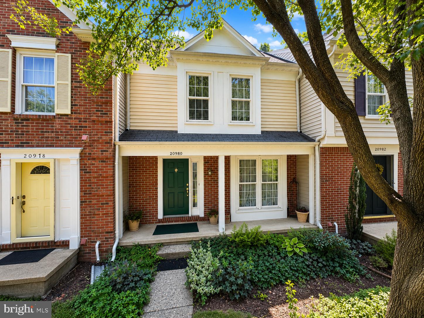 Welcome to this beautifully maintained 3-bedroom, 2.5-bath townhouse in the sought-after Ashburn Farm community, offering a thoughtfully designed living space with a versatile floor plan, inviting outdoor areas, and access to an impressive collection of neighborhood amenities. From the moment you step inside, rich hardwood floors, elegant crown molding, and abundant natural light create a warm and sophisticated atmosphere throughout the main living areas.The well-appointed kitchen serves as the heart of the home with upgraded countertops, stainless steel appliances, generous workspace, ample cabinetry.  The adjacent living and dining rooms provide the perfect spots for every-day enjoyment and entertaining.Upstairs, the spacious primary suite offers a peaceful retreat with a private en-suite bath, while two additional bedrooms provide flexible options for guests, a home office, hobbies, or additional living space.The fully finished walkout lower level adds valuable versatility and can easily accommodate a recreation room, media space, fitness area, home office, or combination of uses to suit a variety of needs.Notable recent updates include freshly painted interior, new carpet, and a kitchen with new dishwasher, range hood, and quartz countertops.Outdoor living is equally inviting, with a front porch, deck and patio offering wonderful spaces for dining, entertaining, gardening, or simply relaxing while enjoying views of mature trees and landscaped surrounding. Two assigned parking spaces provide everyday convenience.The Ashburn Farm lifestyle extends well beyond the home, with community amenities that include multiple outdoor swimming pools, tennis and basketball courts, playgrounds, sports fields, scenic ponds, picnic and gathering areas, and an extensive network of paved trails winding through maintained green spaces and natural surroundings. Residents also enjoy convenient access to shopping, dining, recreation, public transportation options, and major commuter routes connecting Ashburn with destinations throughout Loudoun County and Northern Virginia.Combining generous great interior spaces and access to one of Ashburn’s most established and amenity-rich communities, this home offers an exceptional opportunity to enjoy comfort, flexibility, and convenience in a desirable location. Schedule your private showing and experience all that this Ashburn Farm townhouse has to offer.