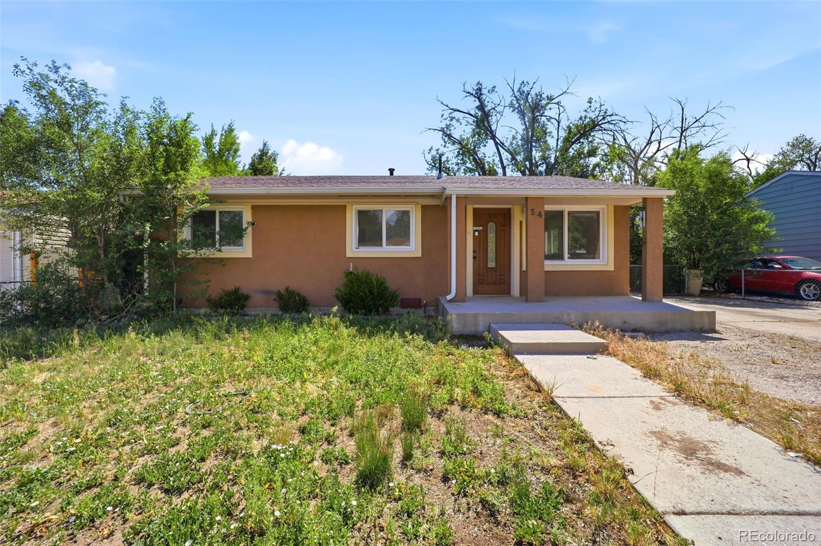 Welcome home to this beautifully maintained 3-bedroom, 1-bath ranch-style home offering comfortable single-level living. Featuring approximately 1,003 square feet of thoughtfully designed living space, this home blends classic charm with modern updates. The updated kitchen opens to a bright and inviting floor plan, while hardwood and tile flooring add warmth, character, and durability throughout. A spacious living area provides the perfect setting for relaxing evenings or entertaining family and friends.Step outside to a generously sized backyard, ideal for outdoor gatherings, gardening, pets, or simply enjoying the beautiful Colorado Springs weather. Conveniently located near shopping, dining, schools, parks, and military installations, this home offers both comfort and accessibility. Don't miss the opportunity to see all that this charming property has to offer—schedule your showing today!