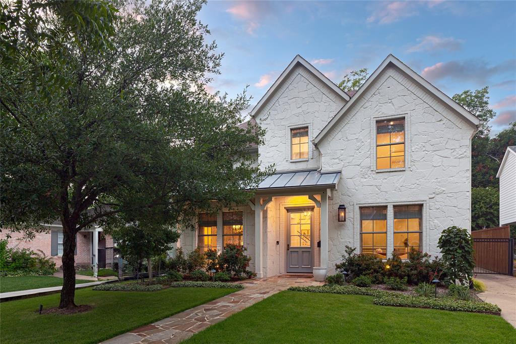 Don’t miss the opportunity to own an absolute jewel box in the heart of East Dallas. Built in 2005 and beautifully transformed with the help of interior designers, Hughes & Lutz Interiors - not a detail was overlooked. Upon entry, you are greeted to a gracious 2-story foyer flanked by the formal dining room and study. Wood floors throughout, level-5 finish walls, and tasteful wood detailing carry you along, past the downstairs guest bedroom and full bathroom, leading to the open kitchen, living, and breakfast nook that are wrapped in windows and natural light. A chef’s dream, the kitchen boasts Thermador and Miele appliances, double ovens, ample storage and White Macaubus Quartzite countertops. The upstairs includes two guest bedrooms with walk-in closets joined by a jack-and-jill bathroom and an oversized laundry room with additional walk-in storage. The primary suite is a true retreat with amazing natural light, automatic window treatments and a large bathroom featuring separate vanities, glass enclosed shower,  soaking tub and his & her closets. Outdoors, a new covered patio with a full outdoor kitchen, turfed backyard and in-ceiling heaters sets the stage for year-round entertaining. A 2-car detached garage and electric drive-way gate are the finishing touches on this swoon worthy home!