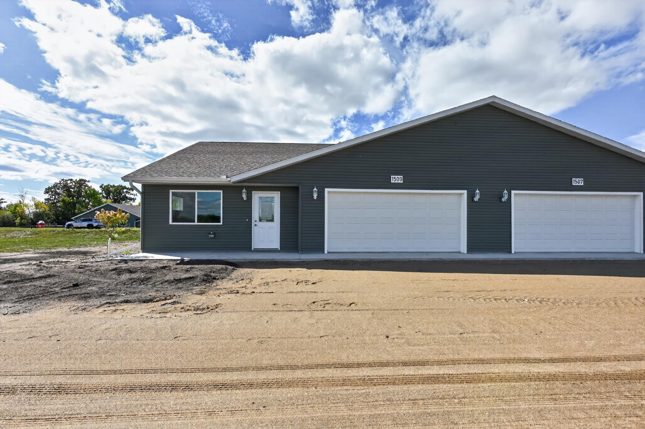 NEW CONSTRUCTION + AFFORDABLE HOMEOWNERSHIP! Don’t miss this opportunity to own a brand-new 2-bedroom, 1½-bath townhome featuring an inviting open floor plan, city water and sewer, and a 2-stall attached garage. Enjoy easy living with lawn care, snow removal and garbage included in the association dues. Plus, with available secondary financing, there is an opportunity for qualified buyers to have a loan amount on this property as low as $282,900, subject to buyer qualification and lender approval. Close to downtown, shopping and schools, this could be the opportunity you’ve been waiting for to make homeownership a reality! All buyers must meet applicable income guidelines.