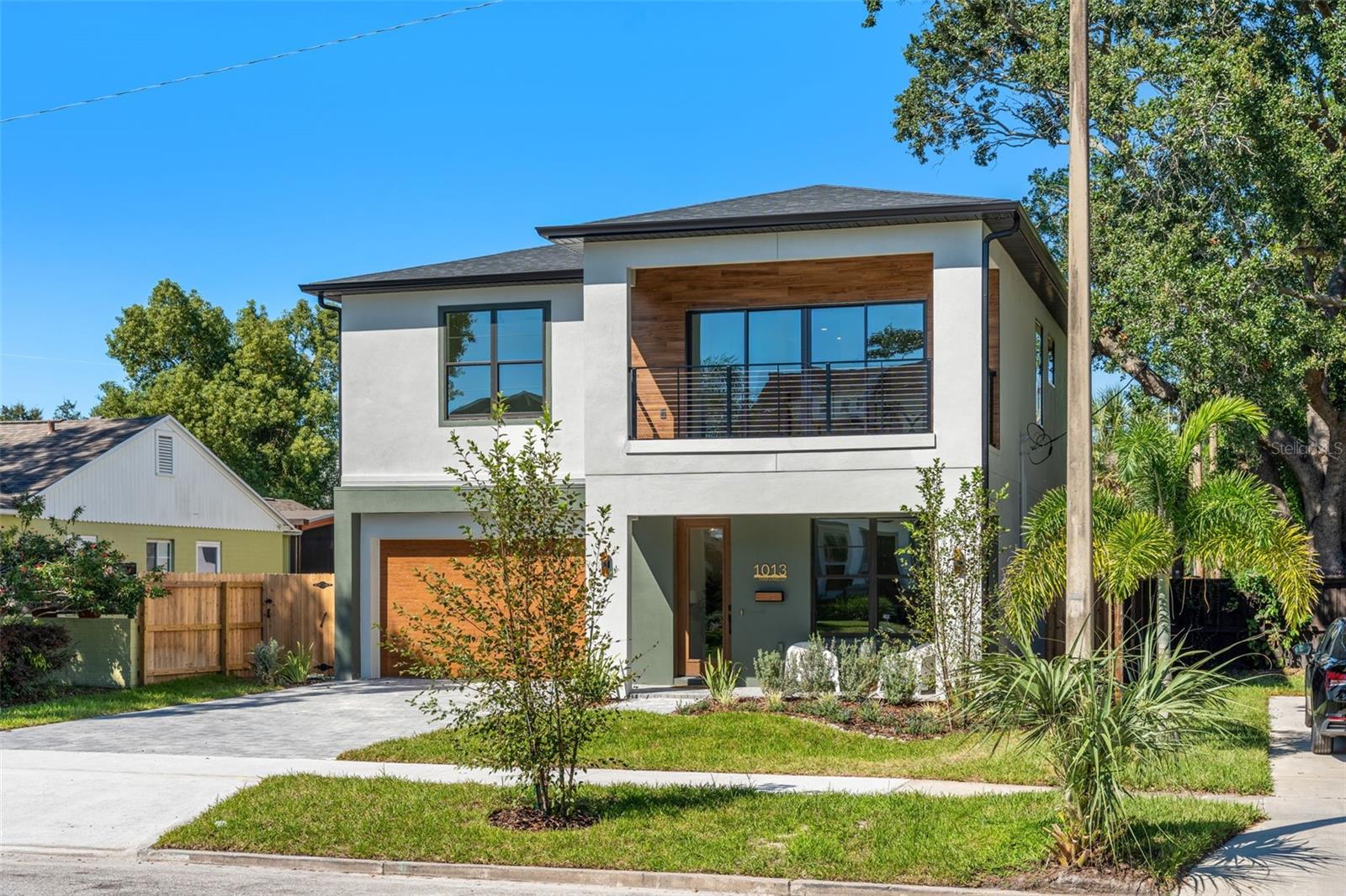 This brand-new College Park home captures everything today’s buyer is looking for. Natural light filters through expansive windows, filling every corner of its nearly 3,100 square feet with warmth and style.A charming front porch sets the tone for what’s inside, modern design with classic neighborhood appeal. The open main floor is anchored by a chef’s kitchen featuring an oversized island, hidden walk-in pantry with beverage fridge, and a clever secondary laundry area. A dedicated office offers the perfect space for remote work or creative pursuits, while a first-floor junior suite with private bath provides flexibility for guests or in-laws. Living and dining areas flow seamlessly toward the covered lanai and pool area.Out back, the pool and pre-plumbed outdoor kitchen set the stage for weekends spent poolside, evening cookouts, and year-round fun in the Florida sun.Upstairs, a bonus loft and balcony provide room to relax or work from home. The primary suite offers a spacious walk-in closet and a spa-like bath with soaking tub and separate shower. Two additional bedrooms, a stylish hall bath, and full laundry complete the second level.Thoughtful design, natural textures, and curated finishes give the home a sense of warmth and sophistication rarely found in new construction.Located within walking distance of Dartmouth Park, Edgewater Drive’s shops and restaurants, Publix, and Starbucks, and just minutes from Downtown Orlando, AdventHealth, Lake Highland Prep, and Bishop Moore High School, this home places you perfectly at the center of College Park living.Move in just in time to celebrate the holidays in a space that feels designed for gathering, connection, and everyday ease.College Park real estate redefined.
