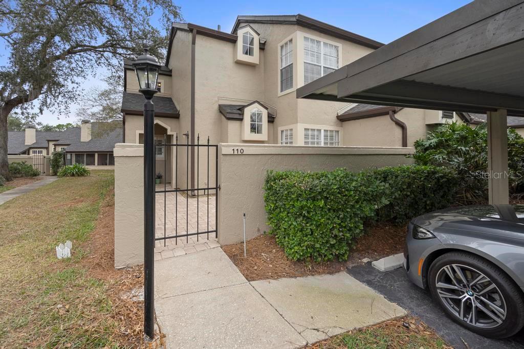 **SELLER OFFERING CONCESSION TO BUYER AT CLOSING TO COVER A 2/1 INTEREST RATE BUY DOWN.** This beautifully updated townhouse style condo home is a must-see, located along the highly desired Markham Woods corridor between Heathrow and Alaqua Lakes Golf and Country Clubs in the gated community of Barclay Place at Heathrow, this 2-bedroom, 2-bathroom end unit combines style, comfort, and convenience.
The private courtyard in the front is perfect for outdoor relaxation or grilling under the majestic oak trees. Step inside to discover an open, airy floor plan, highlighted by vaulted ceilings and an inviting living room with a wood-burning fireplace, ideal for cozy nights. The updated kitchen features shaker cabinets, granite countertops, and new stainless-steel appliances. All windows are furnished with plantation shutters.
The primary bedroom is conveniently located on the ground level, featuring a walk-in closet and a beautifully updated en-suite bathroom with walk in shower. The upstairs bedroom has its own full bathroom —perfect for guests or family members. The screened-in rear porch offers peaceful views and a quiet space to unwind. There's extra storage space under the stairs and in the laundry room off the kitchen.
This community recently underwent an improvement project, including new roofs, gutters, and stucco. The freshly painted exterior and well-kept interior makes this home truly move-in ready. Community amenities include a pool, tennis courts, clubhouse, and covered parking. 
Just minutes from shopping, dining, entertainment, and downtown Lake Mary. Easy access to major highways (I-4, 417 and 429) makes travel to the beaches and Orlando a breeze. Whether you are relaxing at home or enjoying the nearby Seminole Wekiva Trail, this community offers everything you need. Furniture negotiable.
Schedule your private showing today. ROOF 2023, HVAC & WH 2015