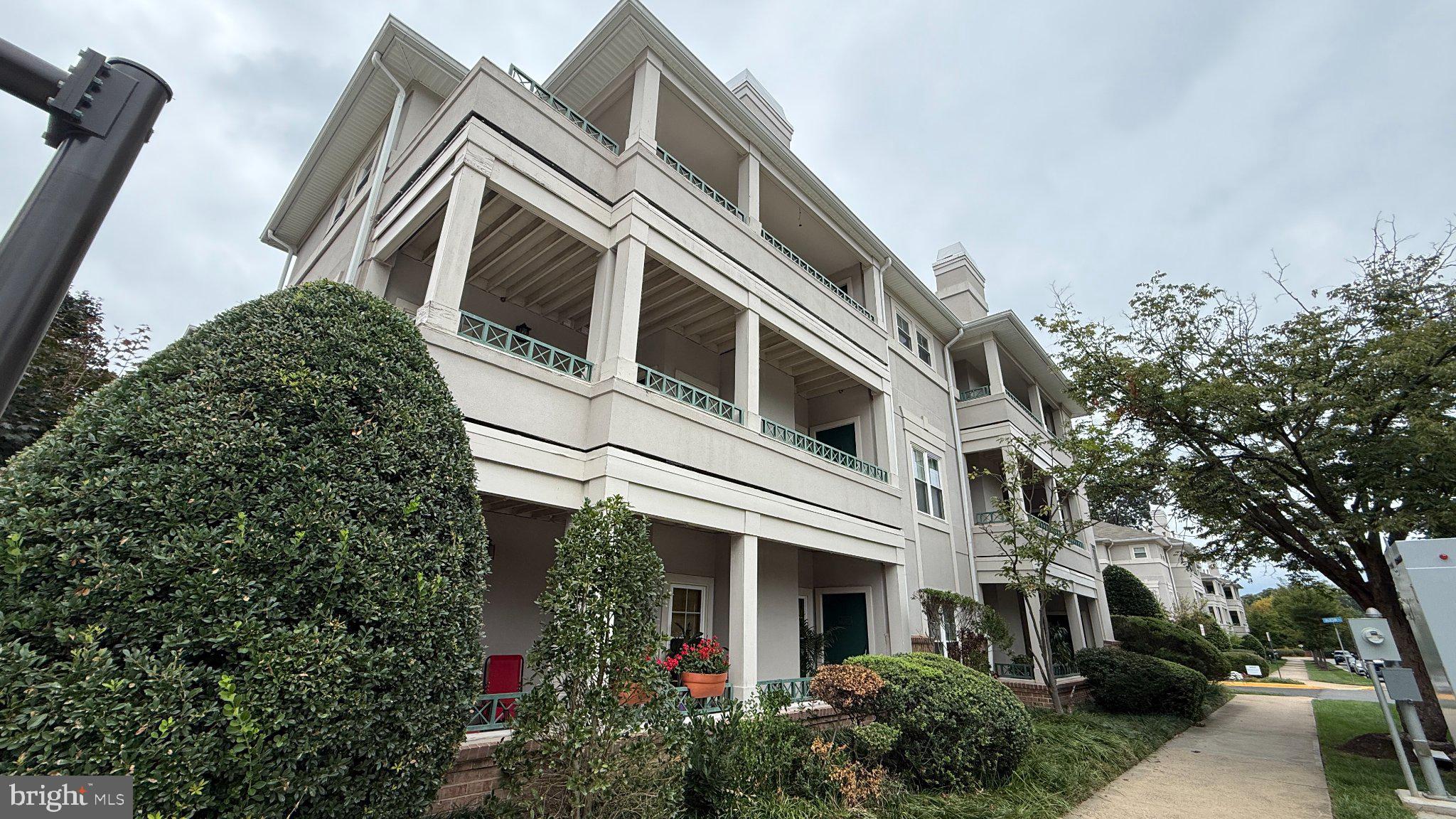 Enjoy all the perks of living near Reston Town Center without the higher price! Welcome to the garden style units at Oak Park Condo, ideally located just across the street from the heart of Reston Town Center. Unit #35 offers a comfortable and thoughtfully designed floor plan with a spacious living room featuring a cathedral ceiling and gas fireplace, along with a separate dining room that opens to a large private balcony.The generously sized kitchen features granite countertops, abundant storage, stainless steel appliances, gas cooking, and a stackable, standard-size washer and dryer. The primary bedroom offers a private ensuite bath and large walk-in closet, while the second bedroom includes a spacious closet and easy access to the full hall bathroom. Two unassigned parking spaces are included.Oak Park offers its own collection of amenities, including lovely walking paths, a community house, outdoor pool, and separate fitness rooms for cardio and free weights. And just across the street, Reston Town Center puts an impressive selection of dining, shopping, and entertainment within easy reach. Enjoy restaurants including Fogo de Chão, Barcelona Wine Bar, Heirloom, and Makers Union, along with tons of shopping options and everyday conveniences. A seasonal skating rink and Dine-In Cinema add to the year-round entertainment.For commuters, the Reston Metro is just one mile away, with easy access to the Dulles Toll Road and a short drive to Dulles International Airport. This is a location that truly puts the best of Reston right outside your door.