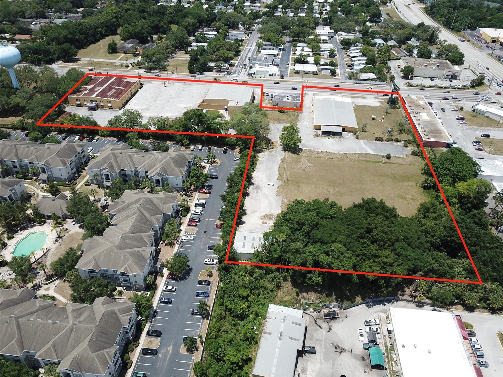 This expansive, well-positioned religious campus offers a rare opportunity for acquisition, repositioning, or redevelopment in a major growth corridor of West Orlando. Nestled along the high-traffic N Hiawassee Road (31,662 vehicles/day), the property spans over 7.7 acres and includes multiple buildings, , dual access points, and a leased billboard generating monthly income.Ideal for developers, mission-driven organizations, or education-focused operators, the site offers visibility, flexibility, and immediate equity potential in a rapidly developing market.Owner will consider financing.