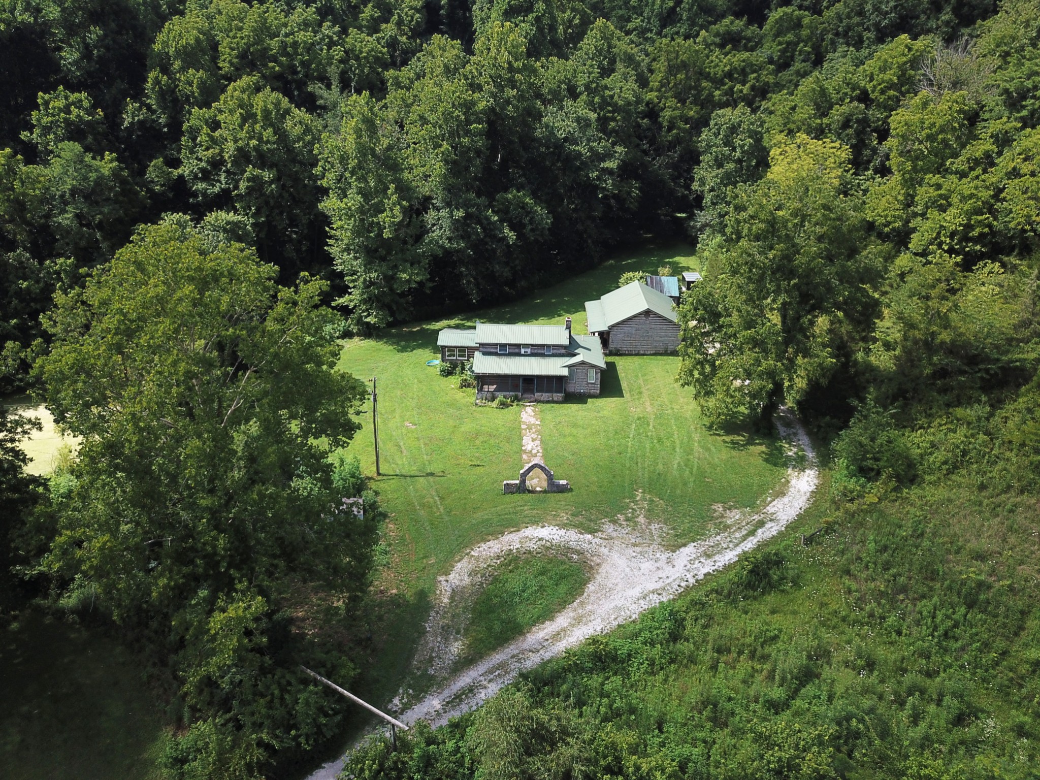 Listing includes 4 parcels for a total of 1,071.61 acres. Dismal Hollow (wooded & hilly) 224.5ac, Eaton Hollow (2 residences, hilly) 489.66ac and 2 tracts on Jakes Branch (258.33ac & 99.12ac). All lots are adjoining and to be sold together. One of the homes (8100 Eaton Hollow) is leased and the other is vacant. Hunting leases are active on most of the properties. Properties are located in Rutherford and Bedford County. The school zoning is for the 8100 Eaton Hollow home.