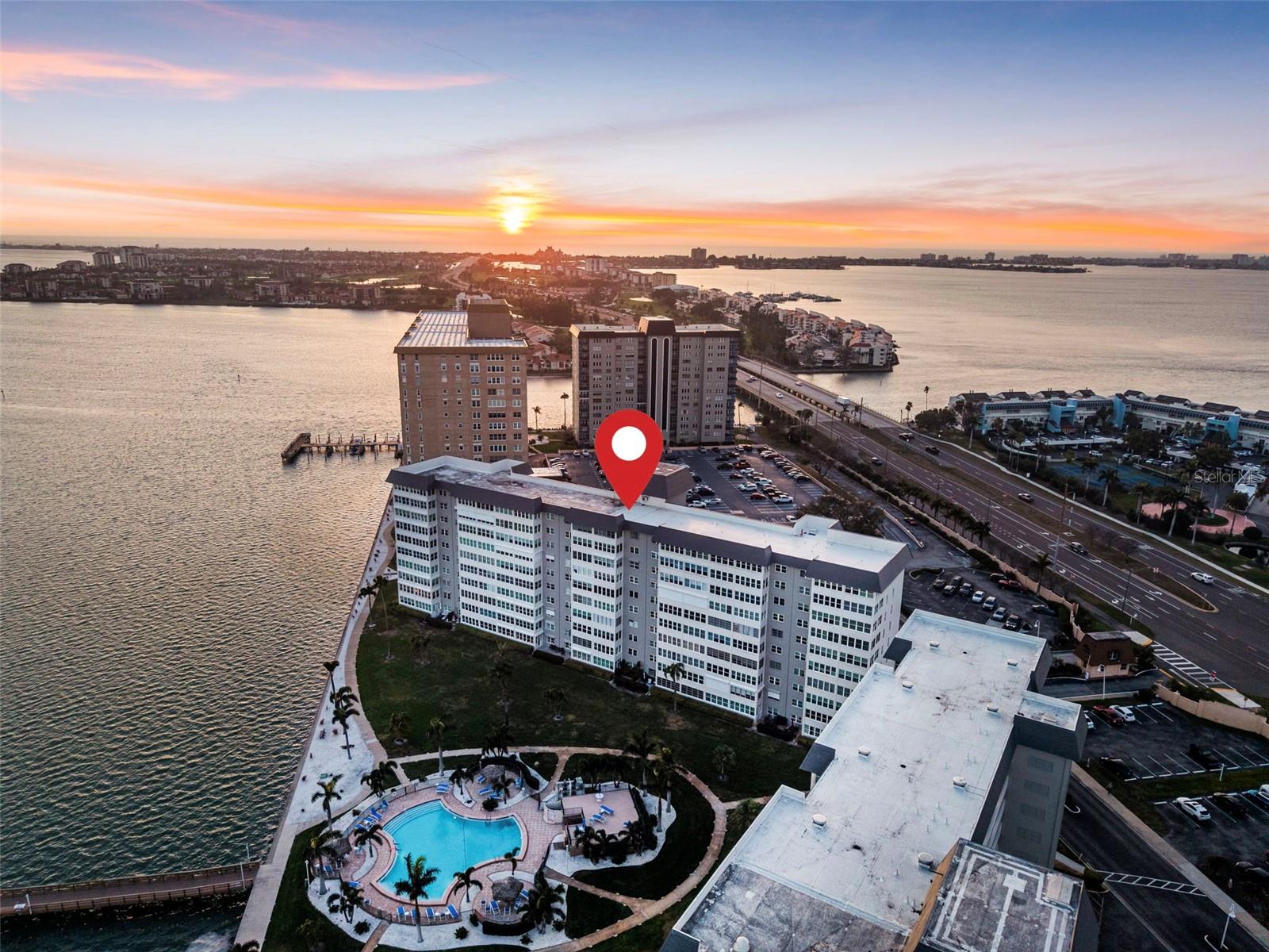 Welcome to waterfront living at its finest in Point Brittany; one of St. Pete’s premier 55+ communities. This fully renovated 2-bedroom, 2-bath residence offers a desirable split floorplan and picturesque, expansive water views that instantly make you feel like you’re living on a private cruise ship. IT IS IMPORTANT TO NOTE THAT THIS BUILDING DID NOT EXPERIENCE FLOODING IN RECENT YEARS DURING THE STORMS AND HAS SUCCESSFULLY PASSED MILESTONE INSPECTION REQUIREMENTS TO WELCOME YOU WITH PEACE OF MIND IN YOUR NEW RESIDENCE!Discover modern upgrades throughout, thoughtfully designed for both style and functionality. The open living and dining areas are flooded with natural light from walls of windows that frame the sparkling intercostal waterways of the Gulf. The split-bedroom layout provides privacy for guests, while the spacious primary suite enjoys tranquil water and sunset views and a beautifully updated modern dual-vanity bath.Beyond your front door, the WATERFRONT lifestyle truly sets this community apart, all you need is within the community. Residents enjoy resort-style amenities including multiple heated pools, beautiful fishing pier, boat parking, relaxing hot tubs, a fitness center, billiards and game rooms, library, your very own on-site market, and a full calendar of social events and activities year-round. Whether you prefer peaceful waterfront mornings or an active, social atmosphere, you’ll find it here.Ideally located just around the corner from the world renowned Gulf beaches, Golf courses, downtown St. Petersburg, dining, shopping, and easy access to I-275, this is maintenance-free coastal living at its best. All you need are your clothes and toothbrush, as this home is sold FULLY FURNISHED AND MOVE-IN READY!Schedule your private showing and experience the St. Pete waterfront lifestyle for yourself!