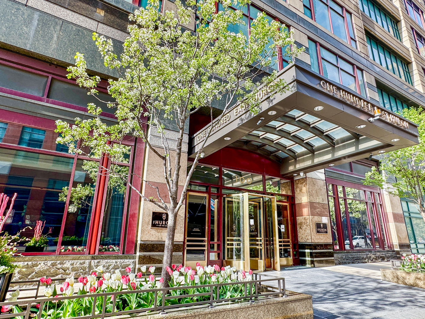 This stunning Marvin Herman-designed 5,500-square-foot, two-story penthouse offers the best of all worlds -- expansive living space that rivals a luxurious single-family home, sweeping lake and skyline views, and access to premier amenities in a top-tier condominium building. Offered for just over $450 per sqft, this home is also a TREMENDOUS VALUE! The custom finishes are truly exceptional, featuring two wood-burning fireplaces (a rarity in a modern high-rise), large-format book-matched marble slab floors and bath walls, wide-plank and herringbone-patterned white oak flooring, designer lighting, custom built-ins and millwork, and beautifully outfitted walk-in closets. The main level wraps three sides of the building, delivering spectacular views in every direction from floor-to-ceiling windows. Generously scaled living spaces include a grand entry foyer with a walk-in closet, formal living and dining rooms, a richly paneled library/office, a media room with bar and projection system, a top-tier kitchen/breakfast room, a butler's pantry, a full laundry room, and two elegant powder rooms. Upstairs, a private retreat awaits with two en suite bedrooms and a comfortable family room. The luxurious primary suite features a wood-burning fireplace, dual marble baths, two walk-in closets, and a bonus room perfect for a nursery, yoga, exercise, office, or dressing room. A third en suite bedroom is located on the main level, thoughtfully positioned apart from the main living spaces. Both levels are elevator accessible. ### The Huron at 100 East offers an exceptional array of amenities, including 24-hour door and maintenance staff, a 54-foot indoor lap pool, fitness center, sundeck with grills, community rooms, monthly and guest garage parking, on-site management, and dry cleaning services. Ideally located near Northwestern Hospital, Michigan Avenue, Millennium Park, and the Loop, this one-of-a-kind penthouse combines the space, comfort, and privacy of a single-family residence with the convenience and security of full-service condominium living.