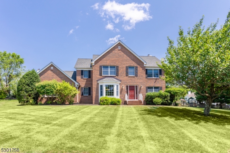 Welcome to one of the larger models in Long Valleys "Brush Meadows" Neighborhood with 3268 of finished sqft not including the finished basement. This Beautiful Colonial sits on a Corner Lot Displaying Elegance with its full Brick facade & 3 car garage. Inside you will find beautiful Hardwood Flooring throughout the first floor. Spacious Formal Dining Room, Living Room and Family Rm w/ Wood Burning Fireplace. The Kitchen will have you in awe as you admire the beauty and size this Custom Designed Kitchen offers. With a large Center Island w/seating holding the 2nd sink, Double Wall Oven & KitchenAide Refrigerator. This Kitchen is a must see. Sliders off the Kitchen will bring you to your private backyard with a beautiful Paver Patio & Fire Pit. Back inside located off the Kitchen is a first floor office w/ closet. Laundry room conveniently located on the first floor. The second level has 4 generous sized bedrooms. Updated Bathrooms on the second level both have Radiant Floor Heating. Add more to your living space with a Finished Basement, offering the third full bath, Rec room, 2nd office, exercise room. Whatever you need the basement for, it is ready for you to make it your own. One of the best highlights of this neighborhood is All Public Utilities: Public Water, Public Sewer, Natural Gas. Some recent updates include: Water Heater 2019, 2-Furnace 2014 & 2024, 2-AC 2014 & 2023, Roof 2012, Whole house built in Generator.