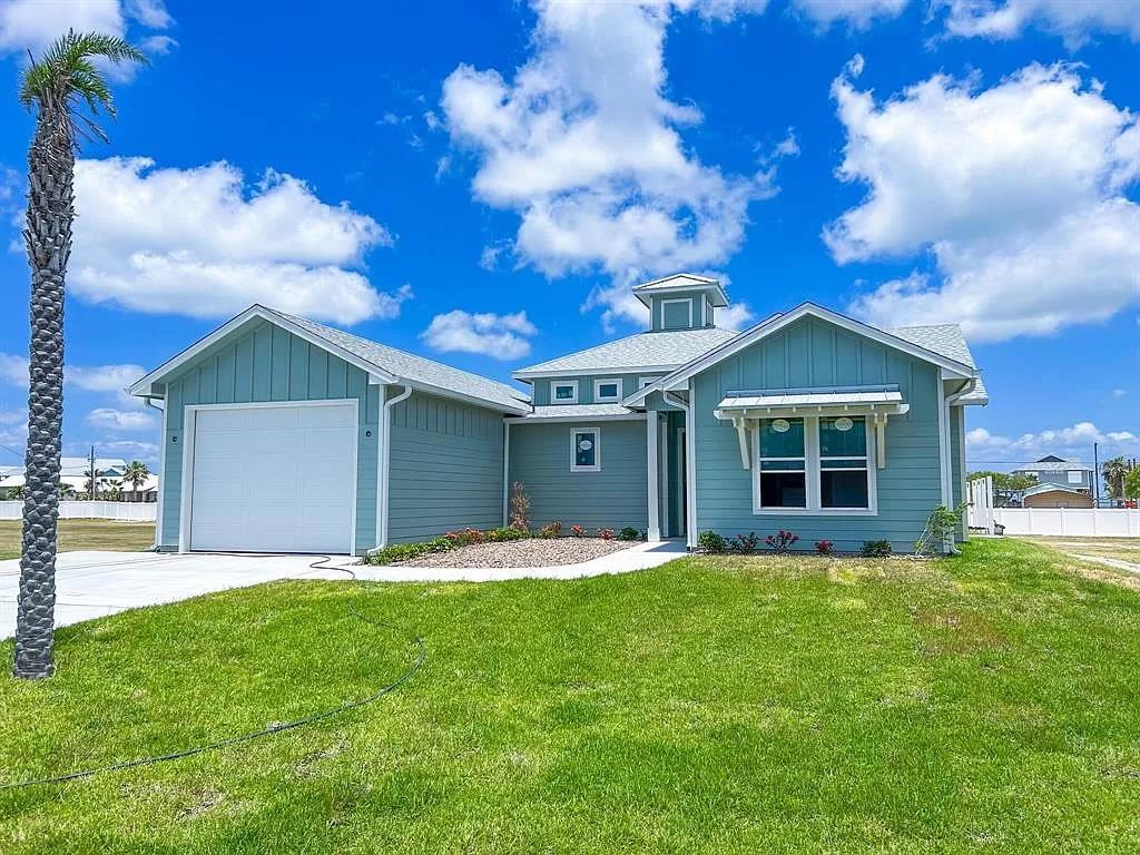 CUSTOM BUILT LUXURY HOME - Located in the Sunset Shores development, which features spacious lot sizes, a private boat ramp, all city utilities & fiber, and sidewalks to enjoy sunset strolls. This beautiful home was designed and built with 3 spacious bedrooms, an open kitchen/living area that is perfect for hosting friends and family, and well designed features with you in mind. From top to bottom the home boasts the exceptional custom quality - KitchenAid appliances, VCS sound and security system, hand-made cabinets, quartz countertops, impact windows, foam insulation, lifetime epoxy flooring, lifetime shingles, oversized insulated garage with Hardie finish & gutters. Built “Fortified Gold”, this home affords significant insurance and electricity savings, and includes a 24 kw Generac generator which will power the entire home! Don't wait, your Coastal Paradise is READY TO ENJOY!