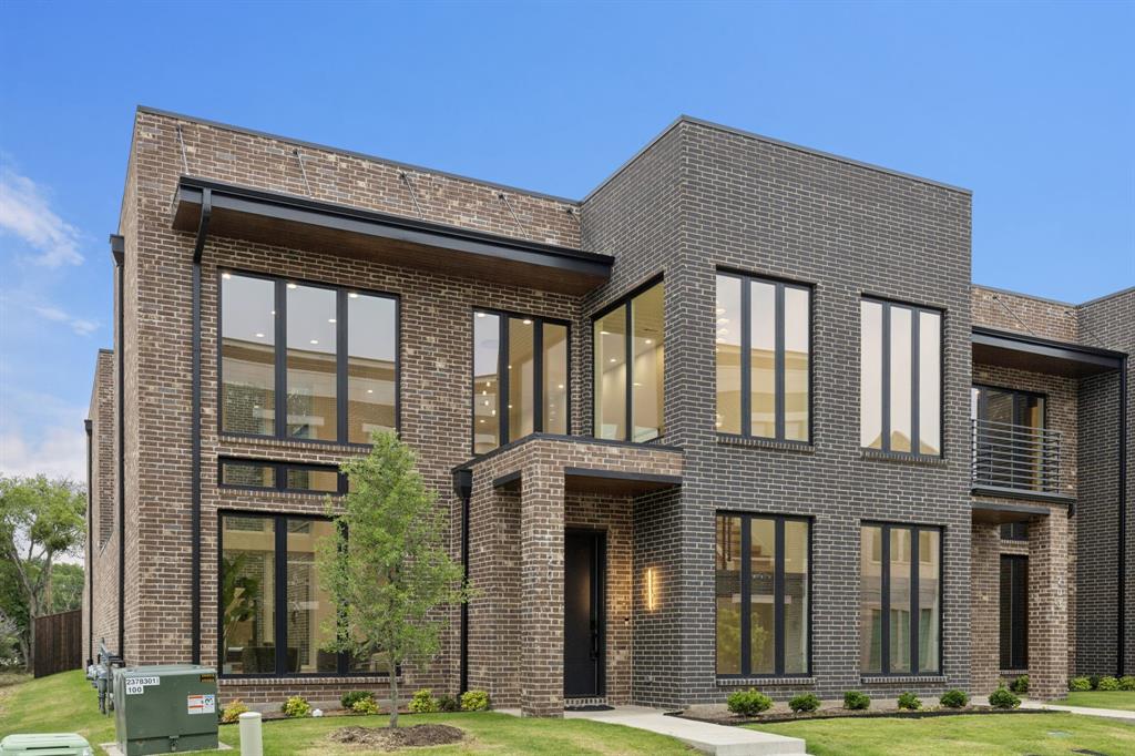 Feel like you're living in NYC or LA in this sleek, modern townhome bursting with style and sophistication. Perfectly positioned in the heart of booming Downtown Roanoke, this rare corner unit is drenched in natural light thanks to walls of windows and soaring ceilings, creating a bright, open feel throughout.
Designer touches abound—from the show-stopping two-story fireplace to statement chandeliers and an upscale bar with wine and beverage fridge. The open-concept kitchen seamlessly connects to a private courtyard via oversized sliding doors—perfect for entertaining or unwinding in style.
The first-floor primary suite offers a spa-like retreat with a luxurious bath and oversized walk-in closet. Upstairs, you'll find two additional bedrooms, a full bath, and a private balcony—ideal for guests or work-from-home flexibility. The oversized 2.5-car garage provides extra space for storage, a golf cart, or hobby area.
This home is also elevator-ready, offering the option to easily add one for convenience and future accessibility.
Enjoy a true lock-and-leave lifestyle with HOA-maintained exterior and front yard. Just steps to Roanoke’s top-rated restaurants, boutique shops, and the Rec Center. Quick access to Hwy 114, Southlake Town Square, and DFW Airport makes commuting a breeze.
A rare gem that blends urban energy with small-town charm—don’t miss this one-of-a-kind opportunity.