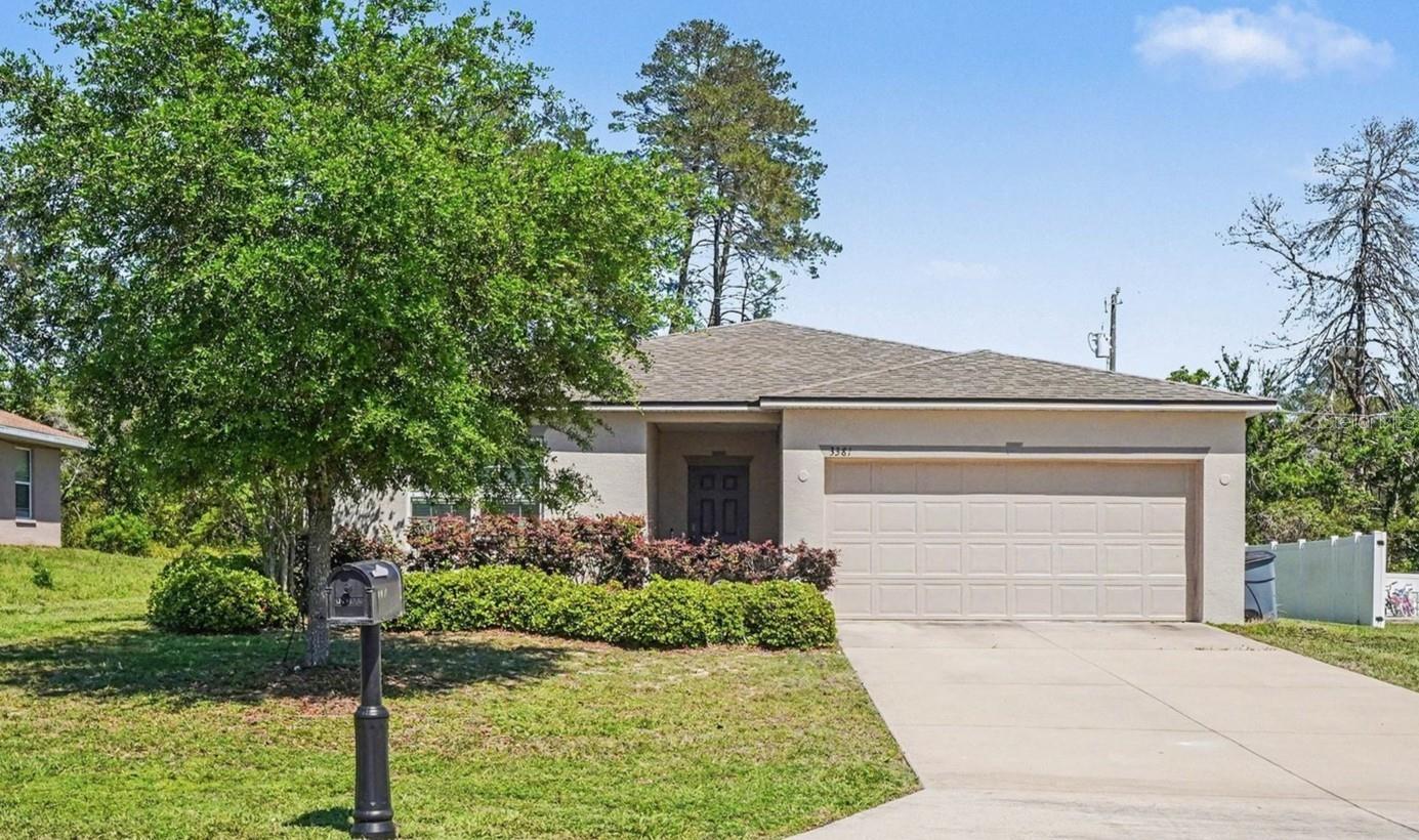 One or more photo(s) has been virtually staged. Welcome home to this beautifully maintained, move-in-ready 4-bedroom, 2-bath retreat in a desirable Ocala location—with no HOA! Built in 2020 and offering 1,919 sq ft on a spacious 0.23-acre lot, this home blends contemporary style with everyday comfort. A thoughtfully designed split floorplan provides privacy, while the open-concept layout is perfect for both relaxing and entertaining.The spacious kitchen features sleek cabinetry, granite countertops, a center island, stainless steel appliances, and ample prep space, flowing seamlessly into the dining and living areas. The primary suite offers a true retreat with a large walk-in closet, oversized shower, and dual vanity. Generous secondary bedrooms provide flexibility for guests, a home office, or play space.Step outside to the screened-in lanai and enjoy peaceful surroundings and beautiful sunset views, perfect for unwinding or hosting gatherings. Additional highlights include a 2-car garage and indoor laundry with washer and dryer included.Ideally located just minutes from the Marion Oaks Community Center, splash pad, and walking trails, as well as shopping, dining, and I-95, this home offers Florida living at its best.
